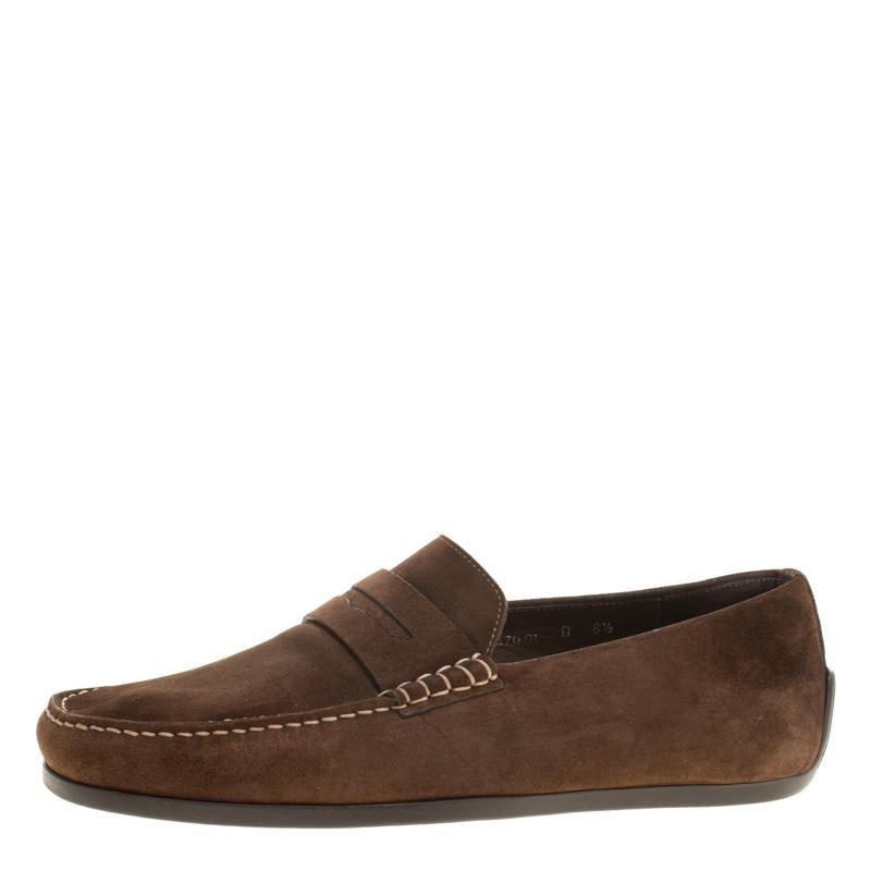 Right on style and comfort, this pair of loafers by J.M.Weston will make a great addition to your shoe collection. They've been crafted from suede and styled with Penny keeper straps. Leather insoles and rubber outsoles beautifully complete the