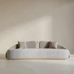 JNK Miami's Como Curved Sofa in Bouclé and Velvet with Gold Accents