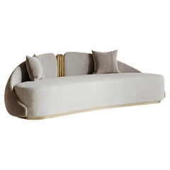 JNK Miami's Como Curved Sofa in Bouclé and Velvet with Gold Accents