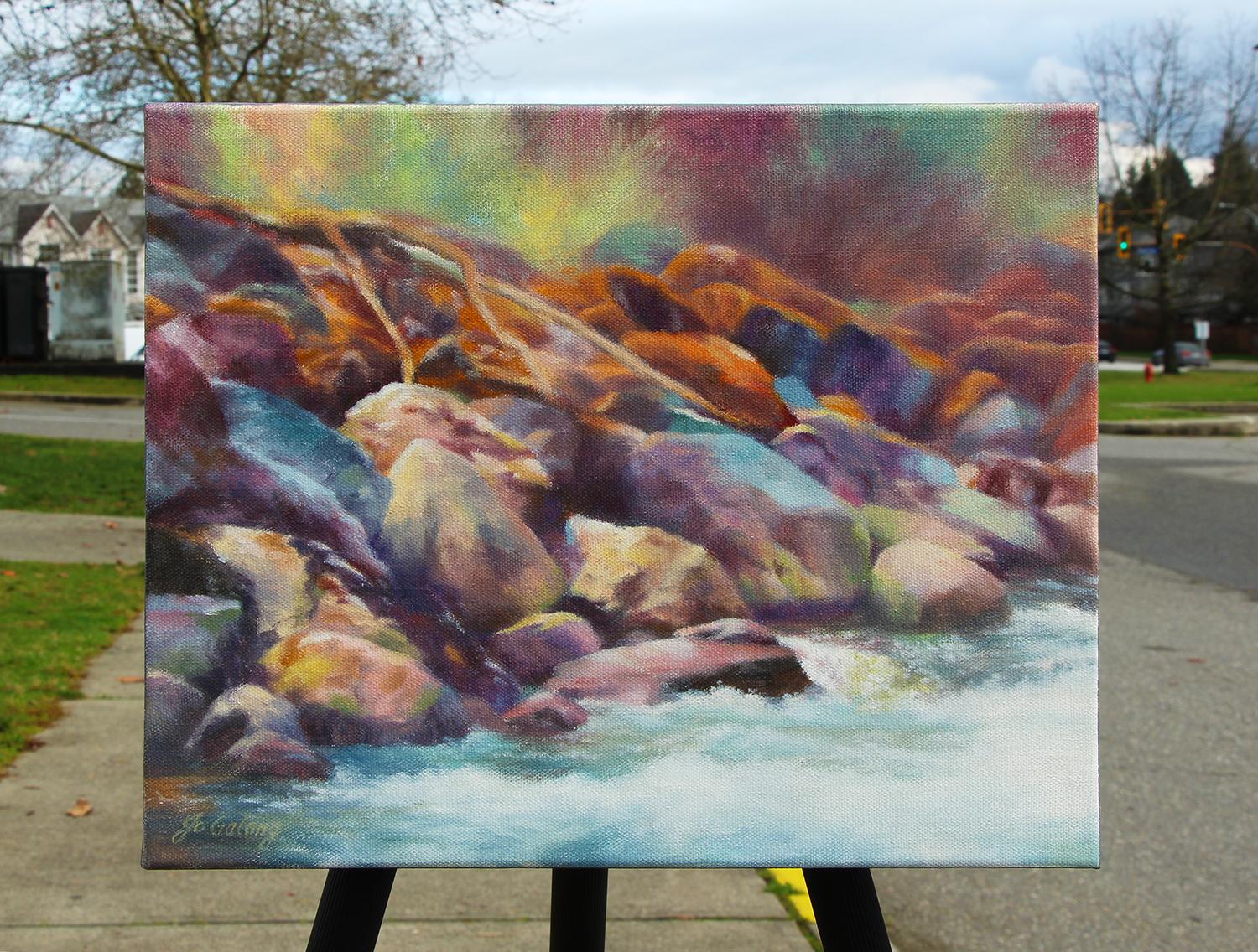 <p>Artist Comments<br>Inspired by the scenic landscapes of the State of Washington, this painting features a mountain of rocks at the edge of a lake. The vibrant contrast of orange, blue, and purple creates an enticing ambiance to the scene. The