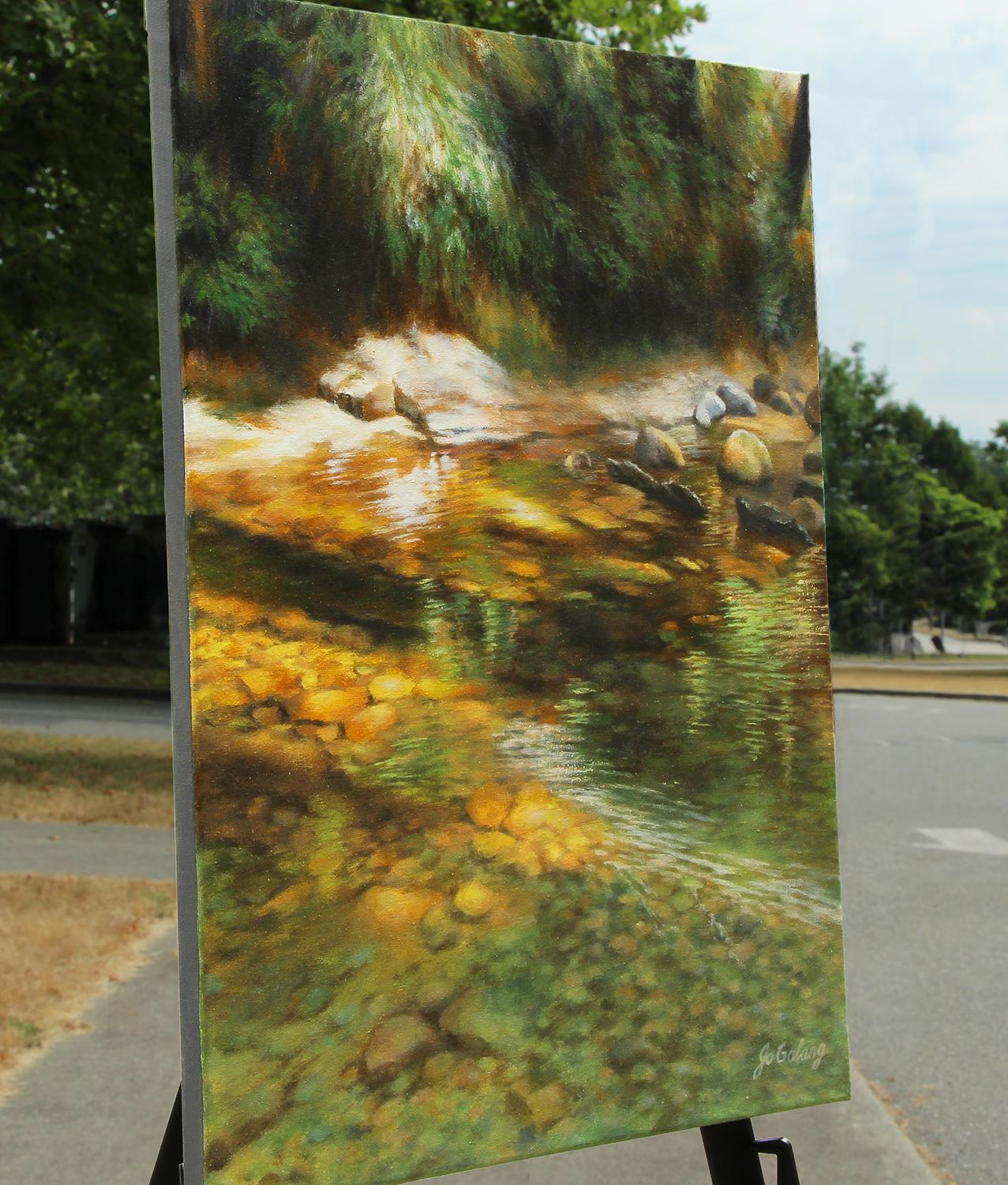 <p>Artist Comments<br>Artist Jo Galang paints a tranquil river tucked in the middle of the woods. 