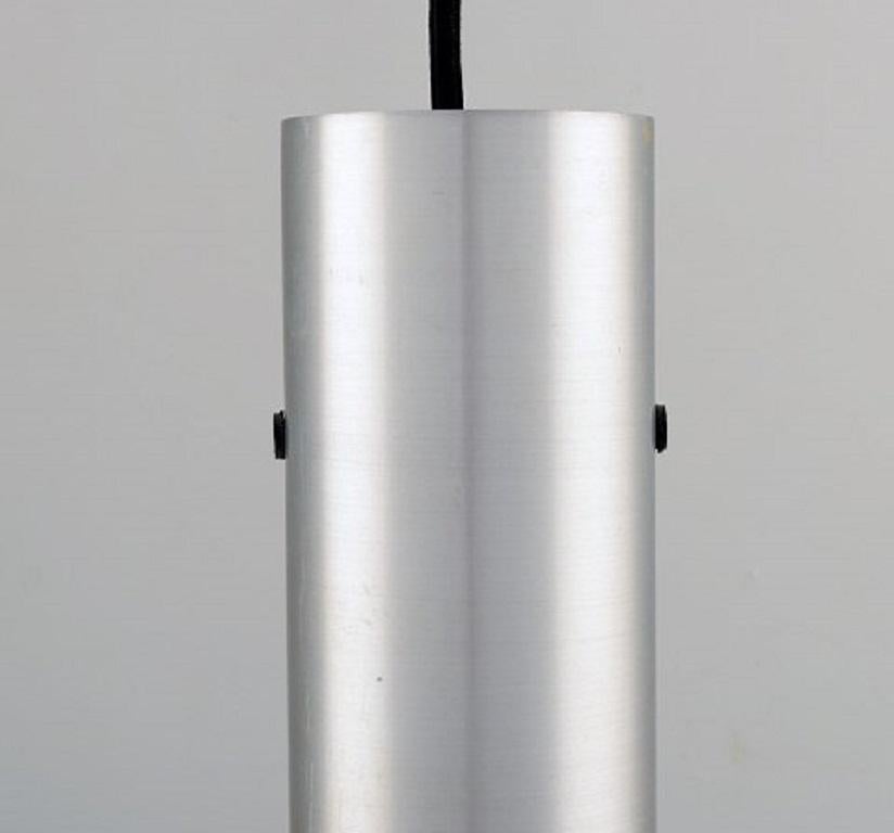 Jo Hammerborg for Fog and Mørup. Trombone ceiling lamp made of aluminium and orange lacquered metal, 1960s.
Measures: 30 x 8 cm
In very good condition.



   