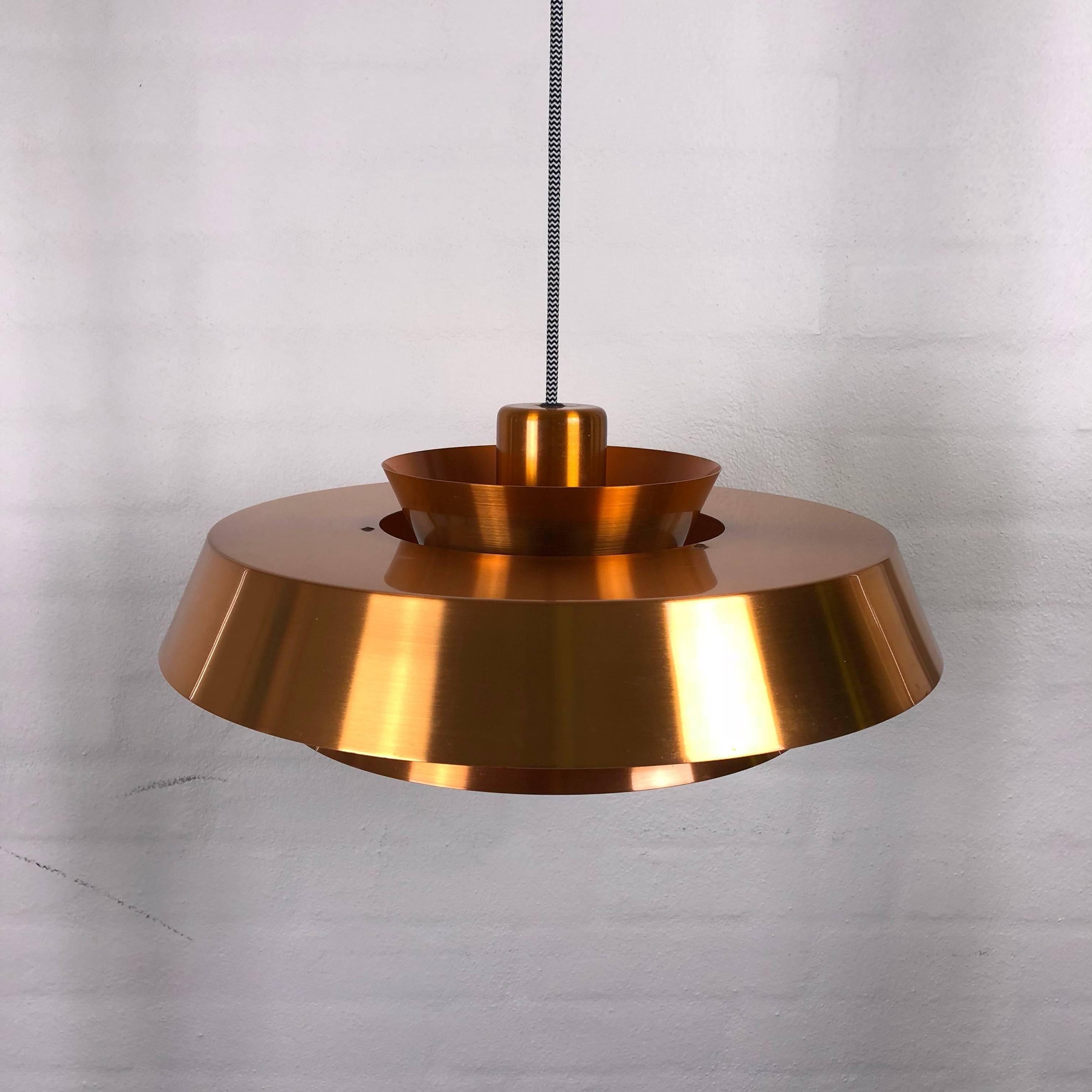 Amazing midcentury lamp - Nova - designed in 1960s by Danish Jo Hammerborg for Fog and Mørup.

The pendant i a classic Danish design and very popular.

The copper model is getting quite rare, so we are pleased to offer you it here.

The inner