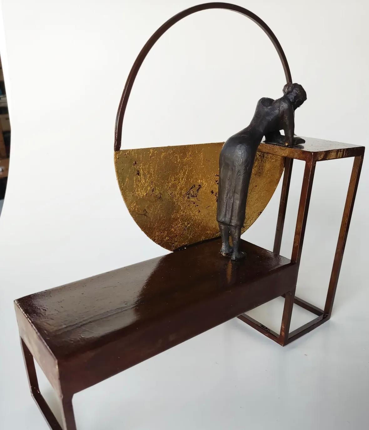 A Room of One's Own is a bronze sculpture with dark patina, it is connected to a steel base. The edition size is 25. This sculpture stands on shelf as well as be hung on wall. 

Joan’s latest sculpture series of female figures brings an