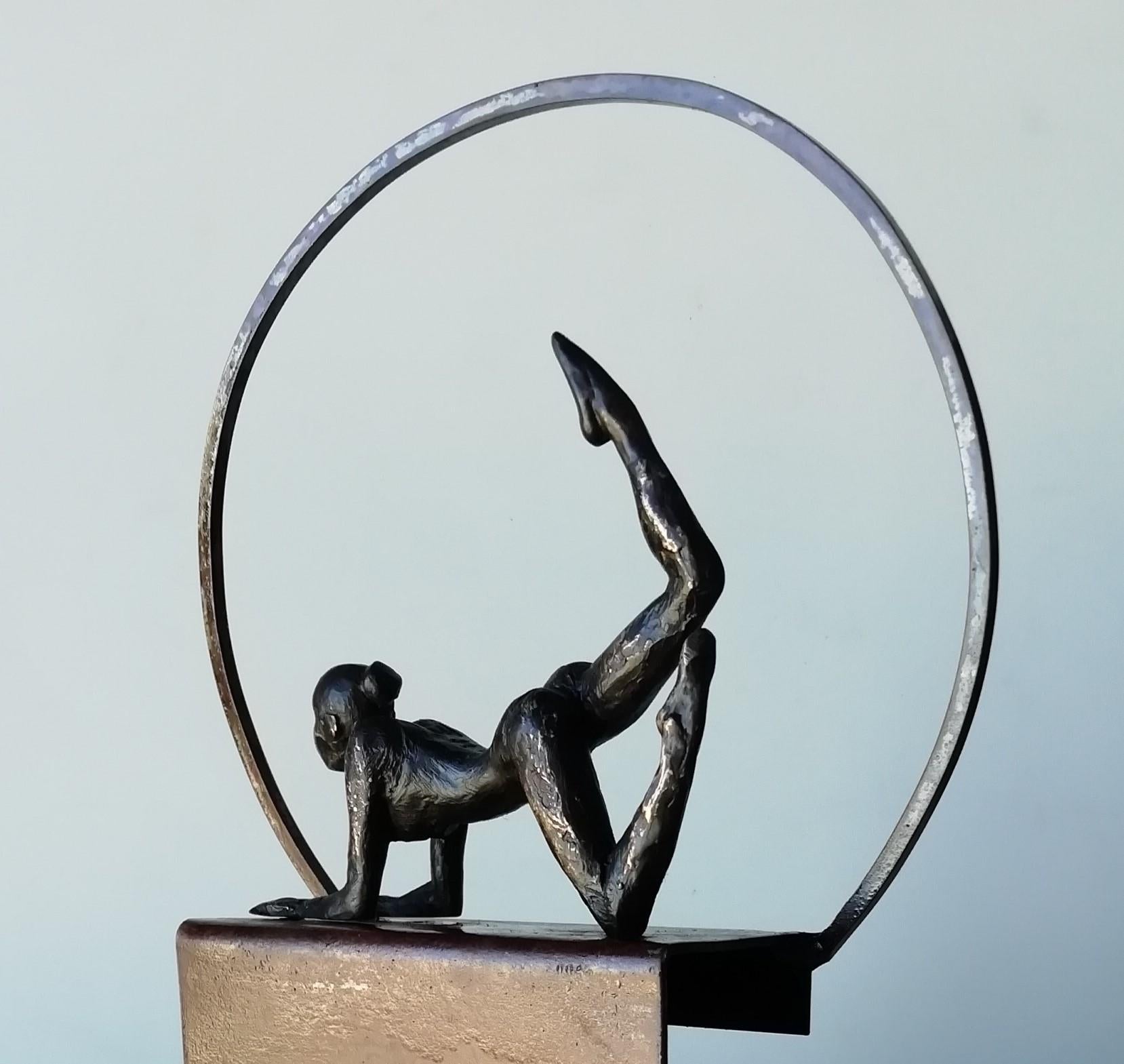 Alegria is a bronze sculpture with black patina, it is connected to a steel base. The edition size is 25. This sculpture stands on shelf as well as be hung on wall. Joan wants to capture the sensuality and elegance of a yoga pose.

Joan’s latest