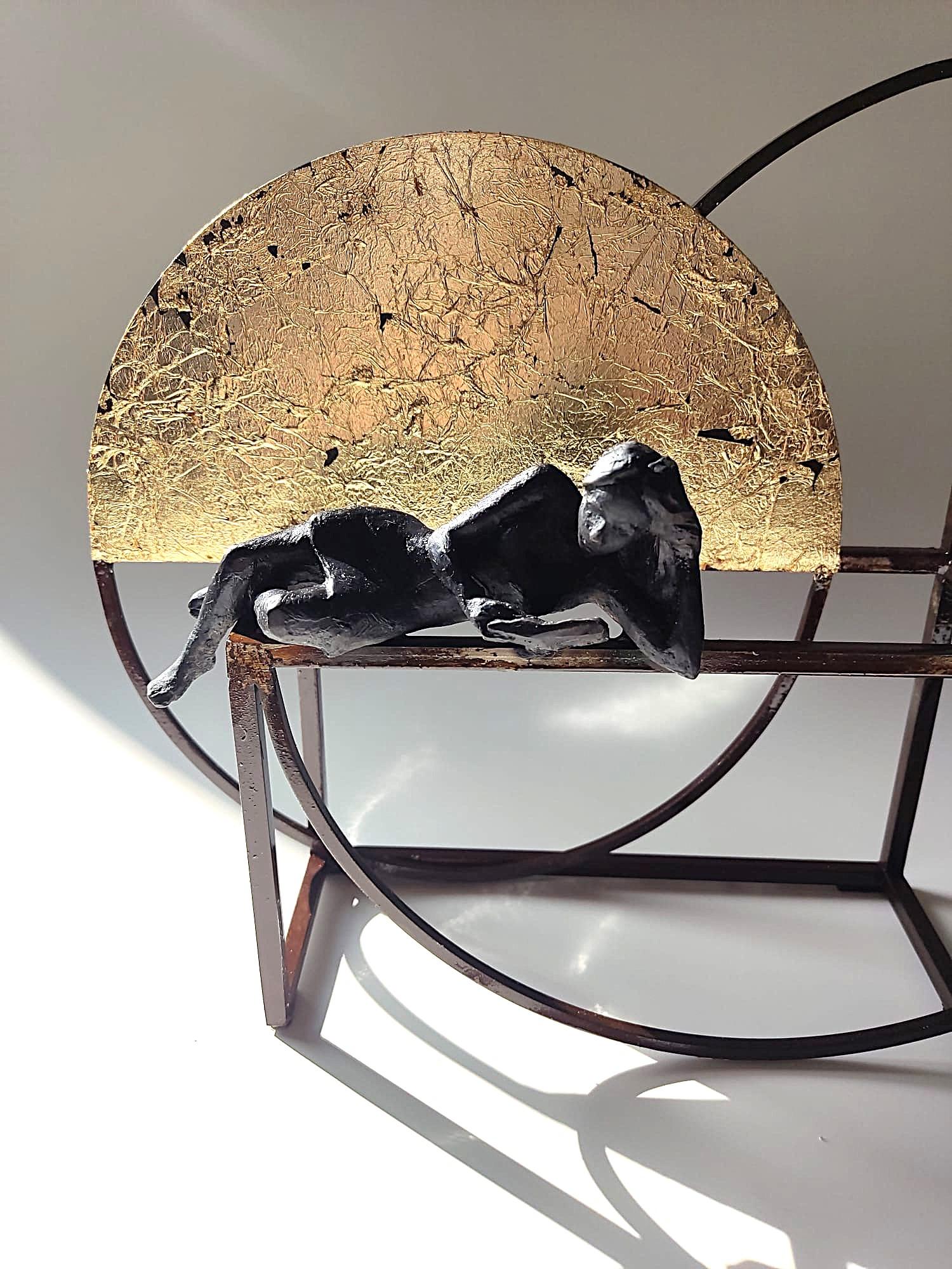 Gattopardo is a bronze sculpture with dark patina, it is connected to a steel base. The edition size is 25. This sculpture stands on shelf as well as be hung on wall. 

Joan’s latest sculpture series of female figures brings an out-of-the-box