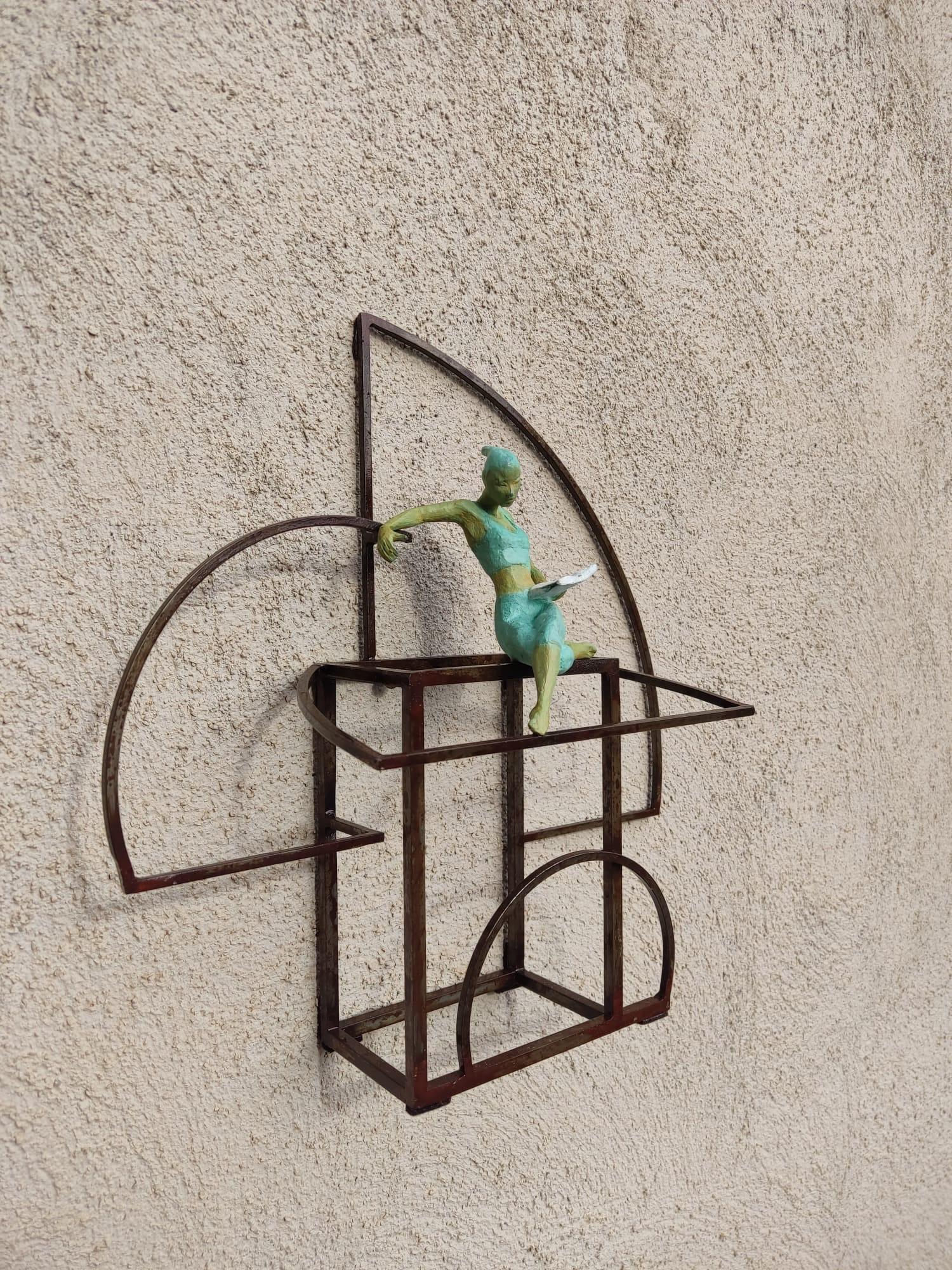 Mythology is a bronze sculpture with green patina, it is connected to a steel base. The edition size is 25. This sculpture stands on shelf as well as be hung on wall. 

Joan’s latest sculpture series of female figures brings an out-of-the-box