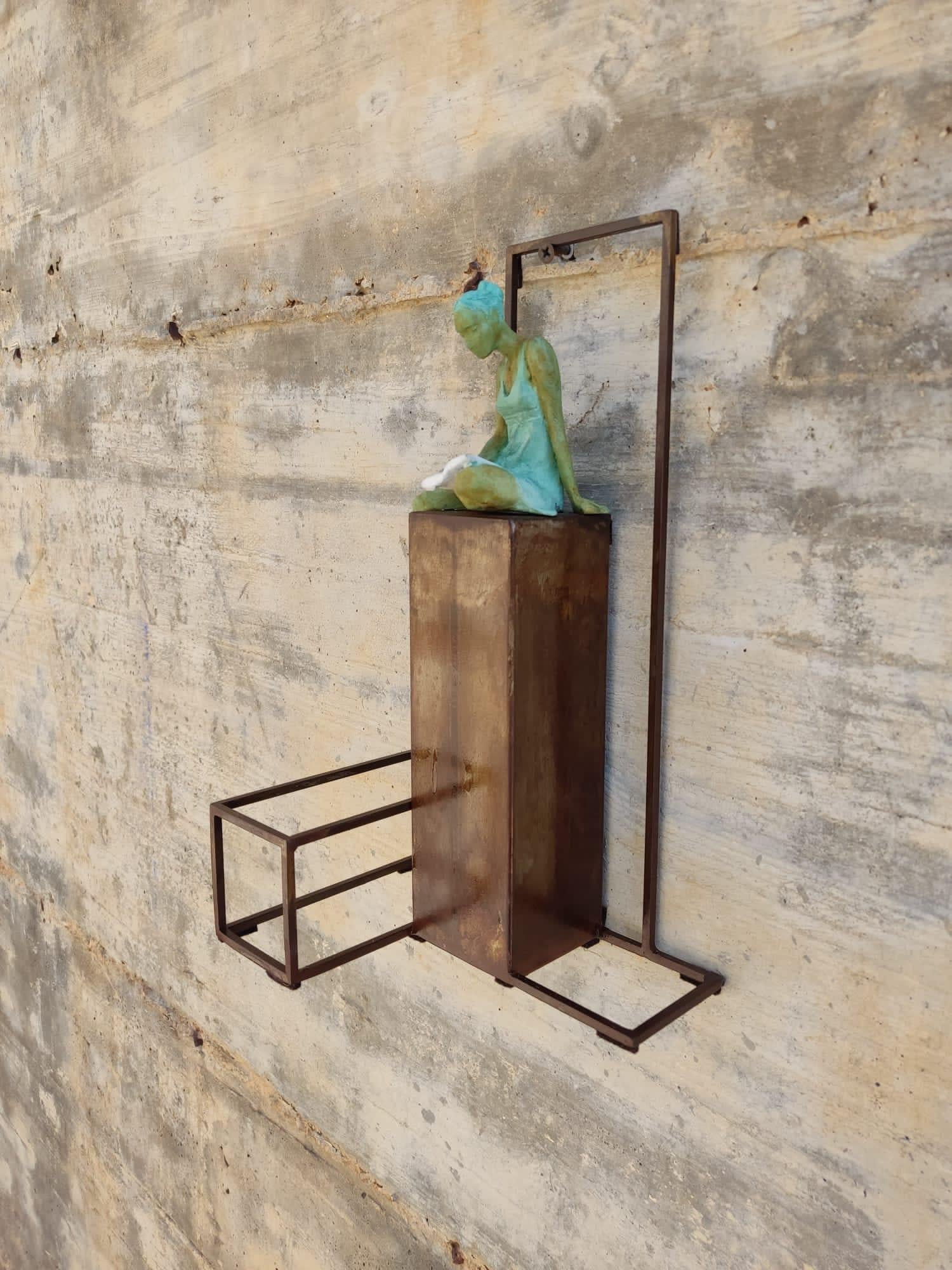 Sense and Sensibility is a bronze sculpture with green patina, it is connected to a steel base. The edition size is 50. This sculpture stands on shelf as well as be hung on wall. 

Joan’s latest sculpture series of female figures brings an