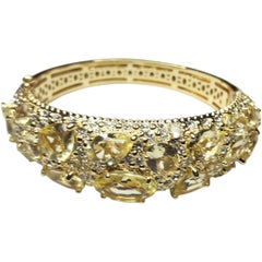 Joan Boyce Vergoldetes Armband mit gelbem Kristall und Strassstein