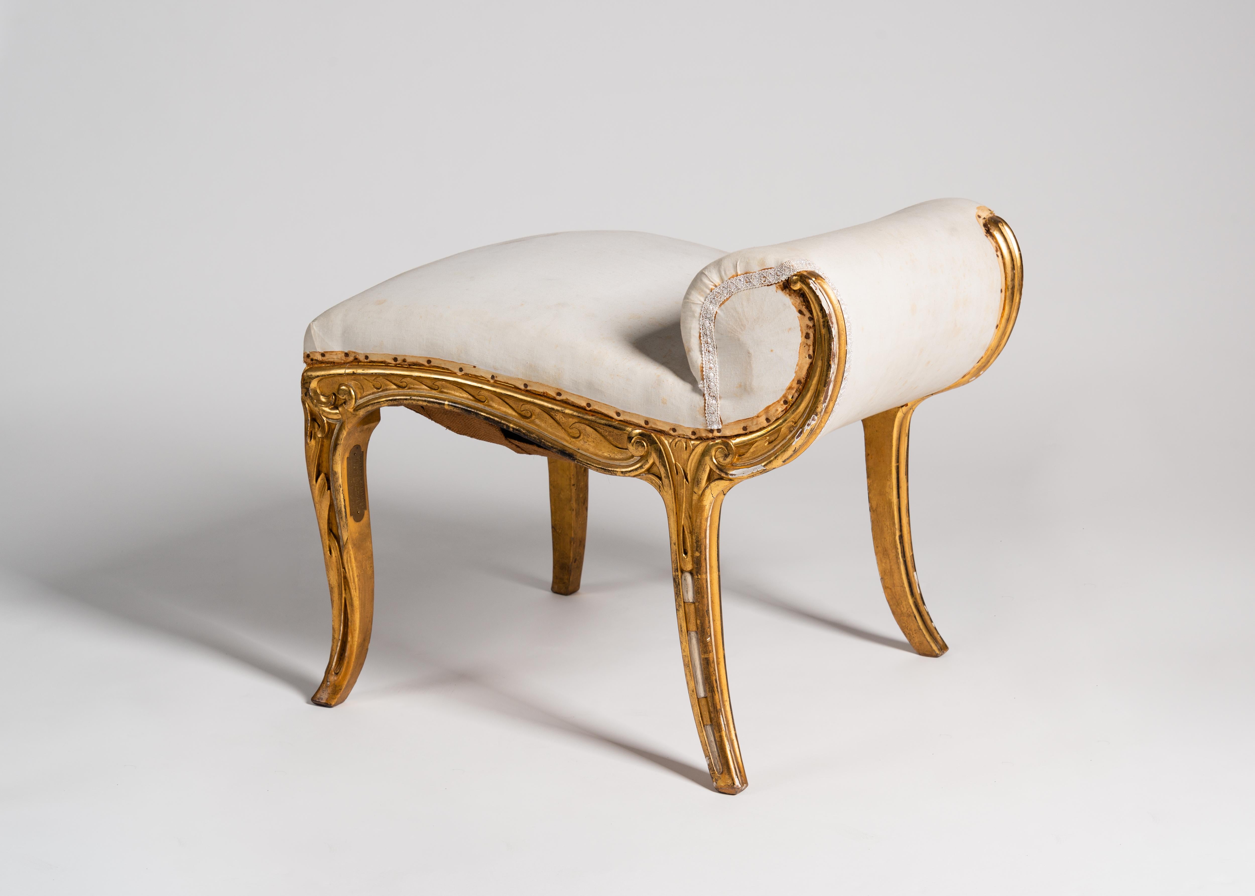 One of a pair of tabourets in the Catalan modernist style by Joan Busquets.

This beautiful pair of sinewy tabourets share subtly splayed legs and gently curling backs of giltwood. The cushions of the back and seat of each possess an elegant