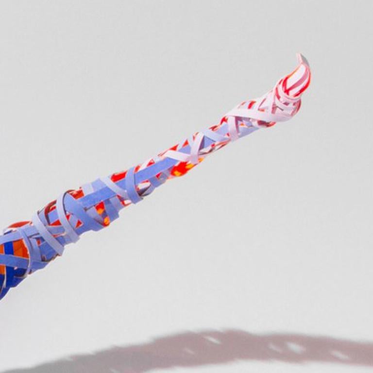 Weaving is a form of drawing, of plotting and connecting lines. Fabricating a three-dimensional, transparent object using thin strips of paper with differing colors on either side results in a kind of two-sided drawing in space. The repetitive,