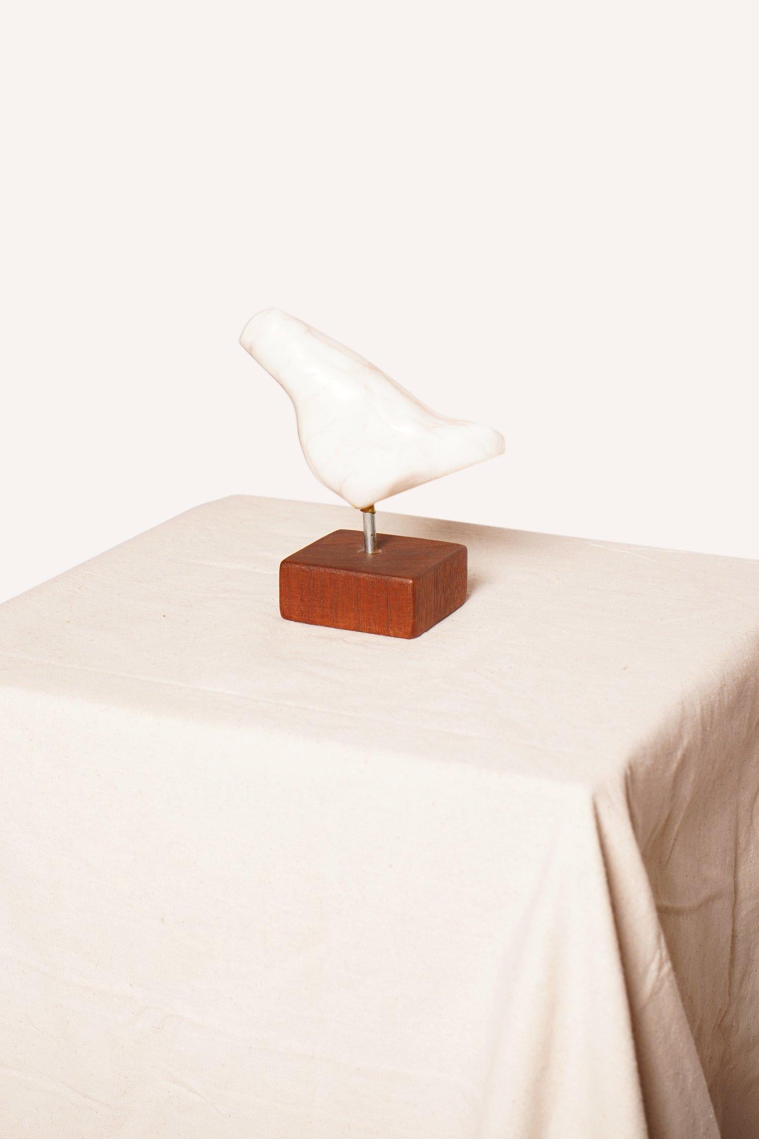 This Joan H. Shapiro carved stone bird sculpture, signed by artist Shapiro whose work was mainly consisted of paintings, drawings, sculpture and collage. There is a modern and lyrical quality to her work.