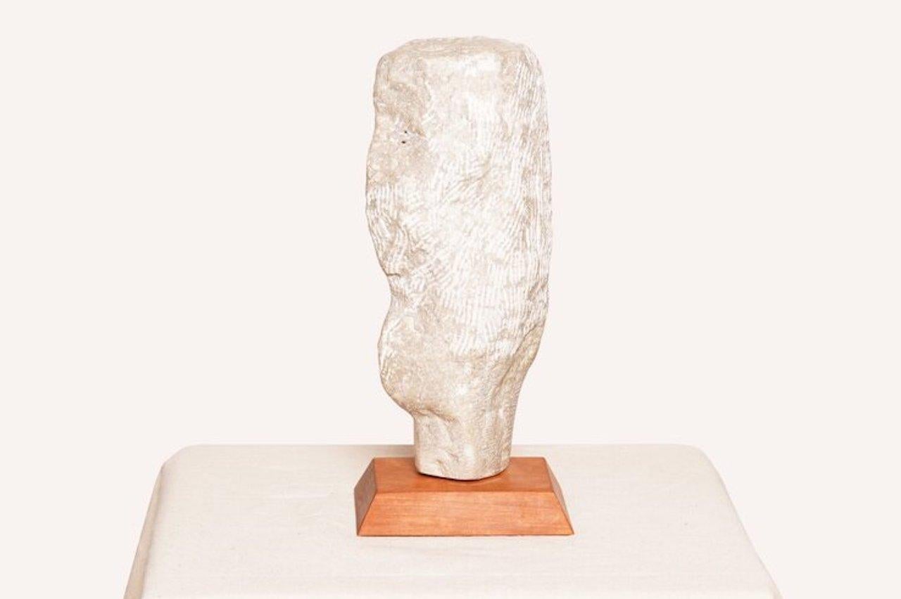This Joan H. Shapiro carved stone head sculpture, signed by artist Shapiro whose work was mainly consisted of paintings, drawings, sculpture and collage. There is a modern and lyrical quality to her work.

