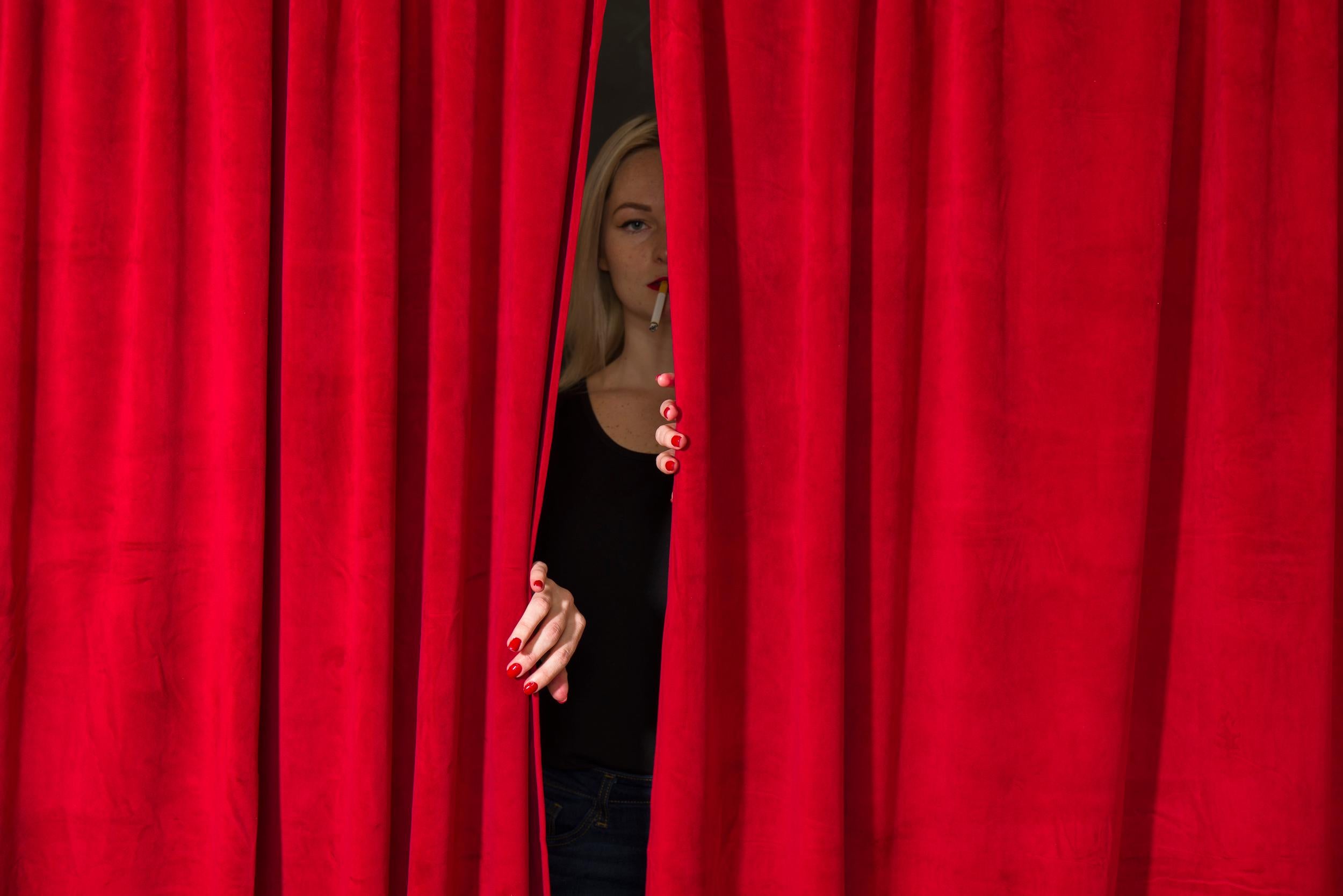 Joan Haseltine Figurative Photograph - Red Curtain
