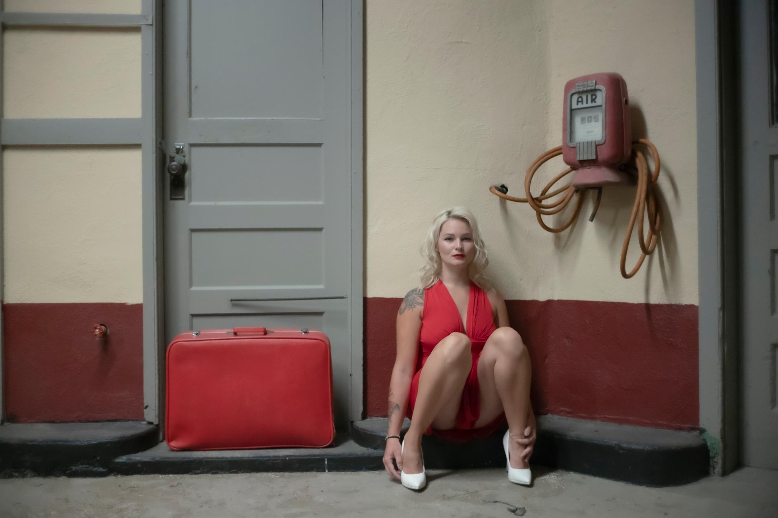 Joan Haseltine Color Photograph - Red Suitcase