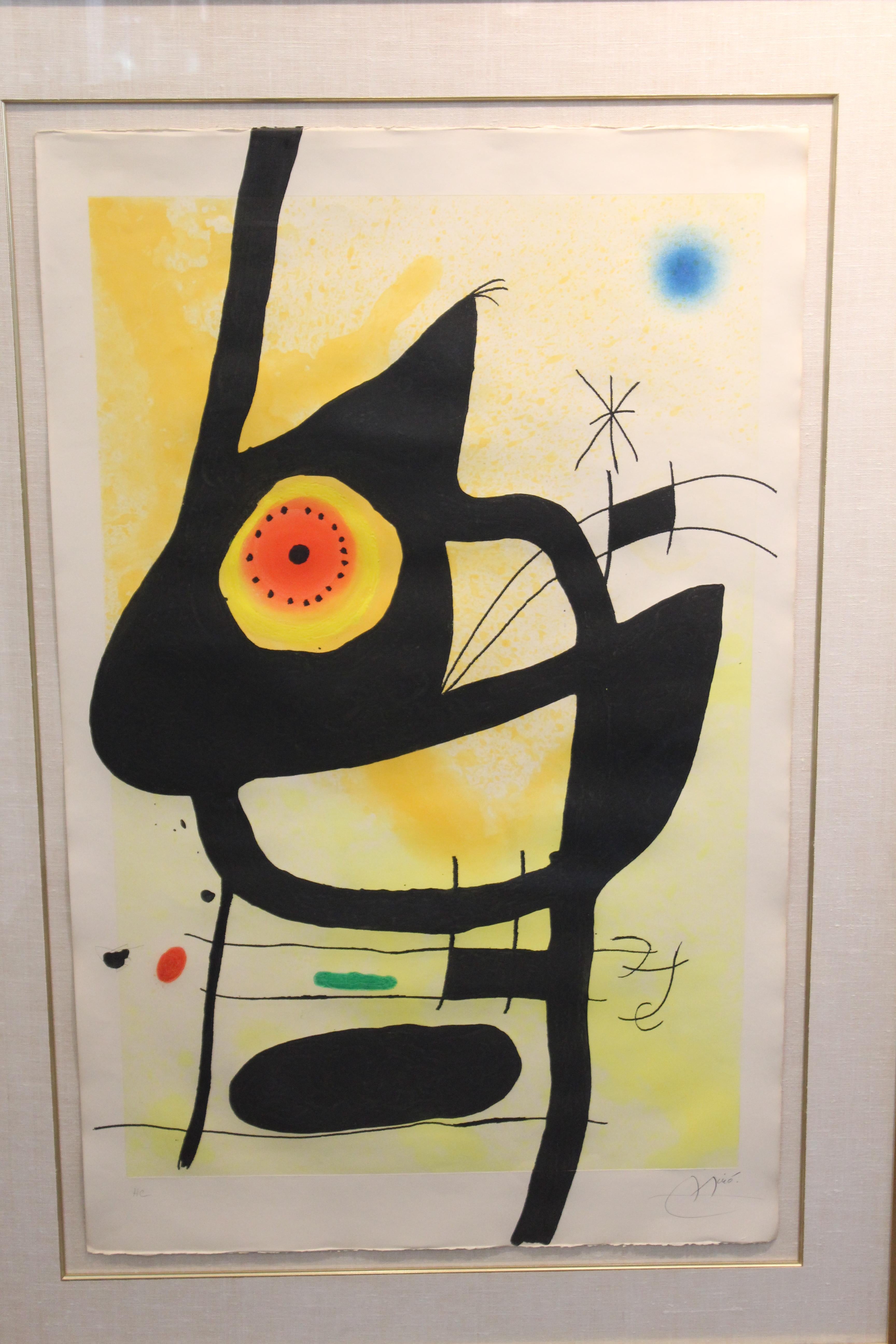 Joan Miro signed and framed print titled 'La Femme Des Sables'. The piece dates from 1969 and is signed 'Miro' in the lower right corner and marked 'HC' in the lower left corner outside the edition of 75. Etching and aquatint process and