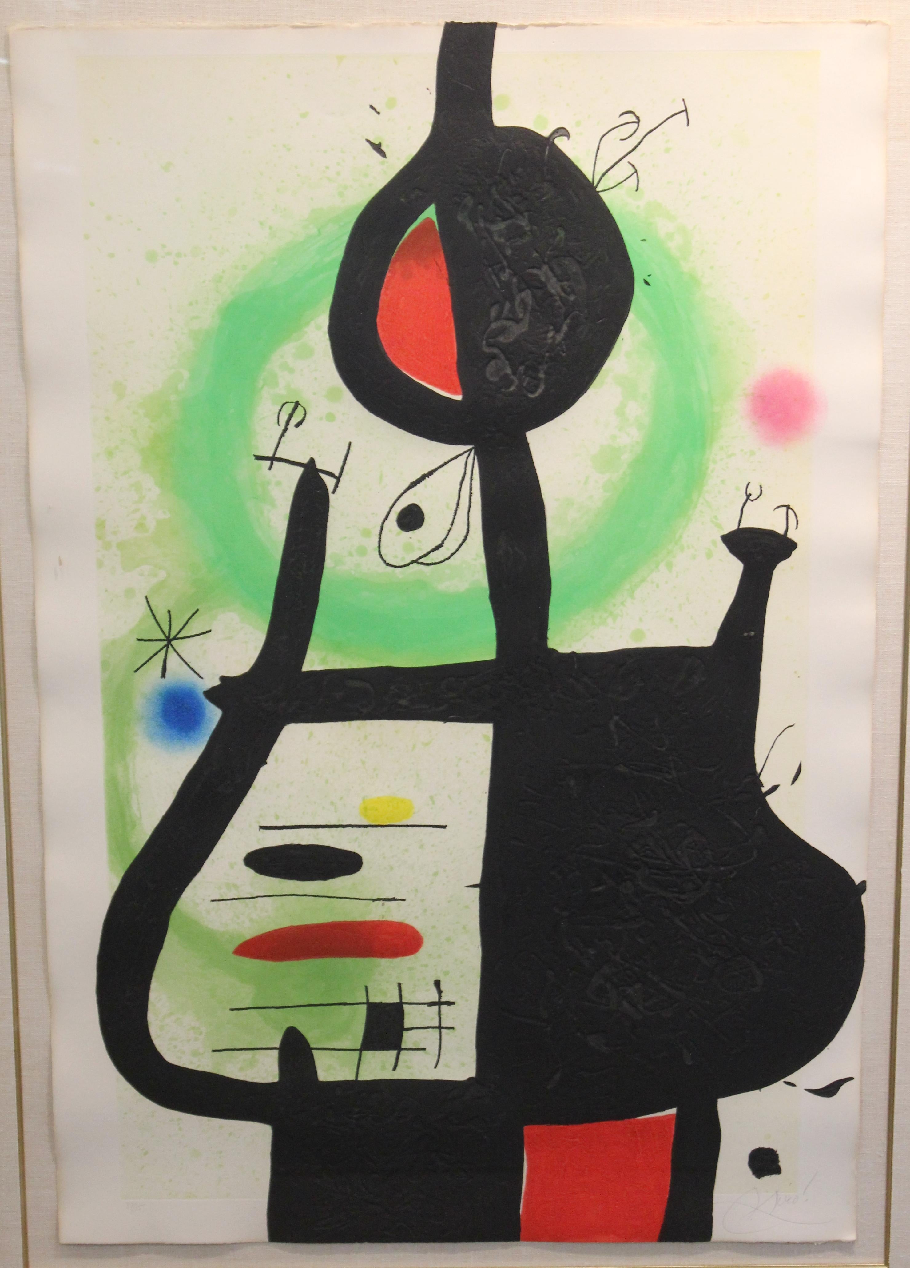 Joan Miro signed and framed print titled 'La Sorciere'. The piece dates from 1969 and is signed 'Miro' in the lower right corner and marked 'HC' in the lower left corner outside the edition of 75. Etching and aquatint process and carborundum. In