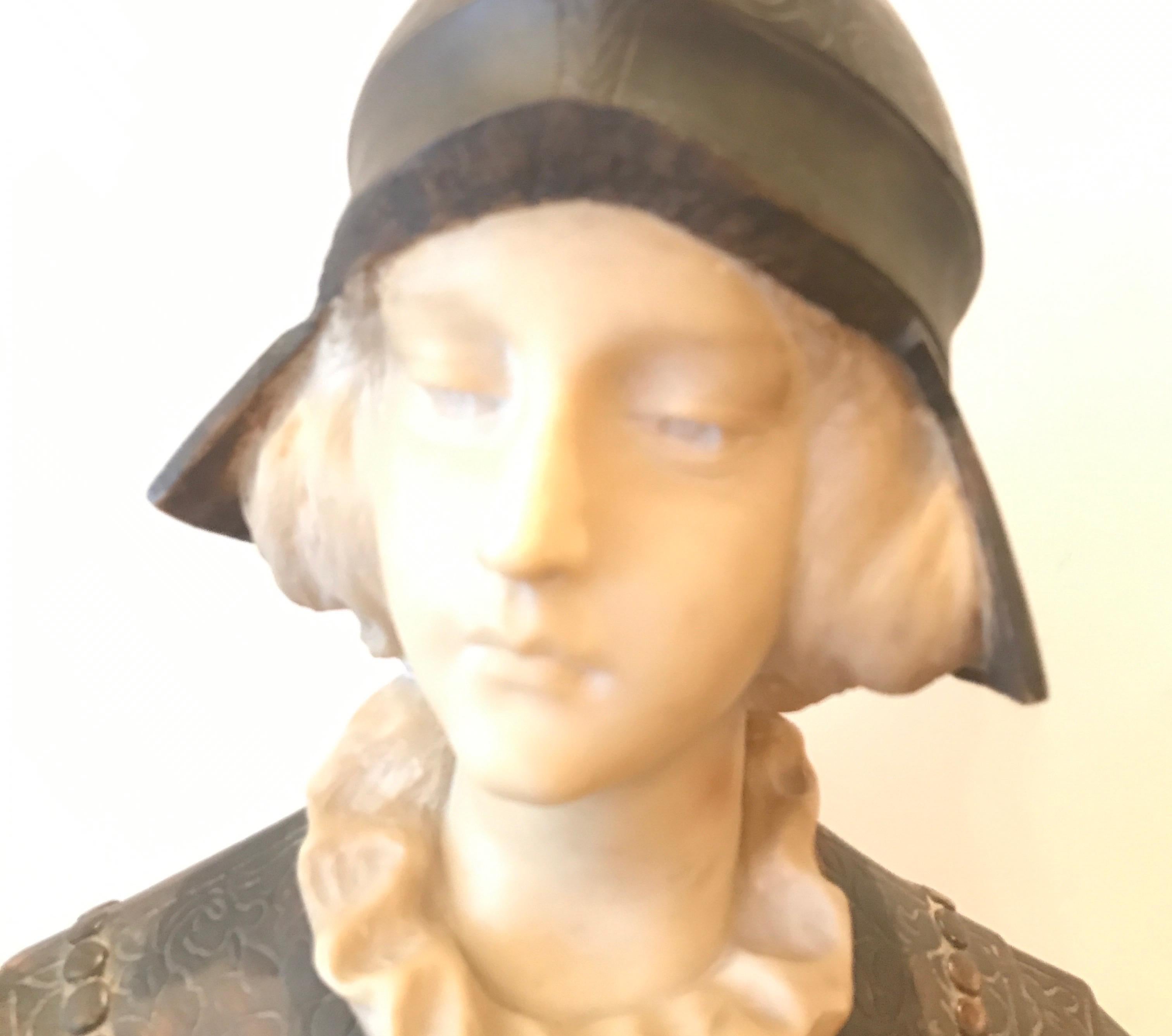 Hand carved alabaster bust of Joan of Arc from the mid-later 19th century, Italy. Artist-signed on the bottom back, illegible.