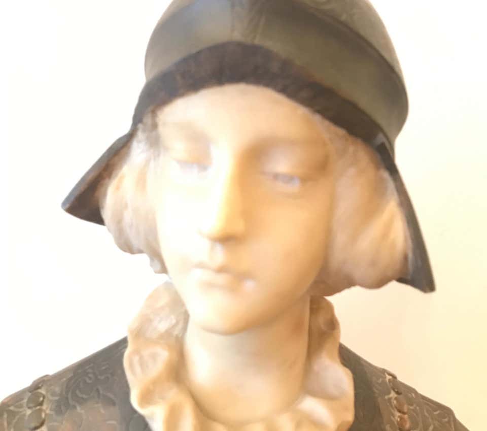 Hand carved alabaster bust of Joan of Arc from the mid-later 19th century, Italy. Artist-signed on the bottom back, illegible.