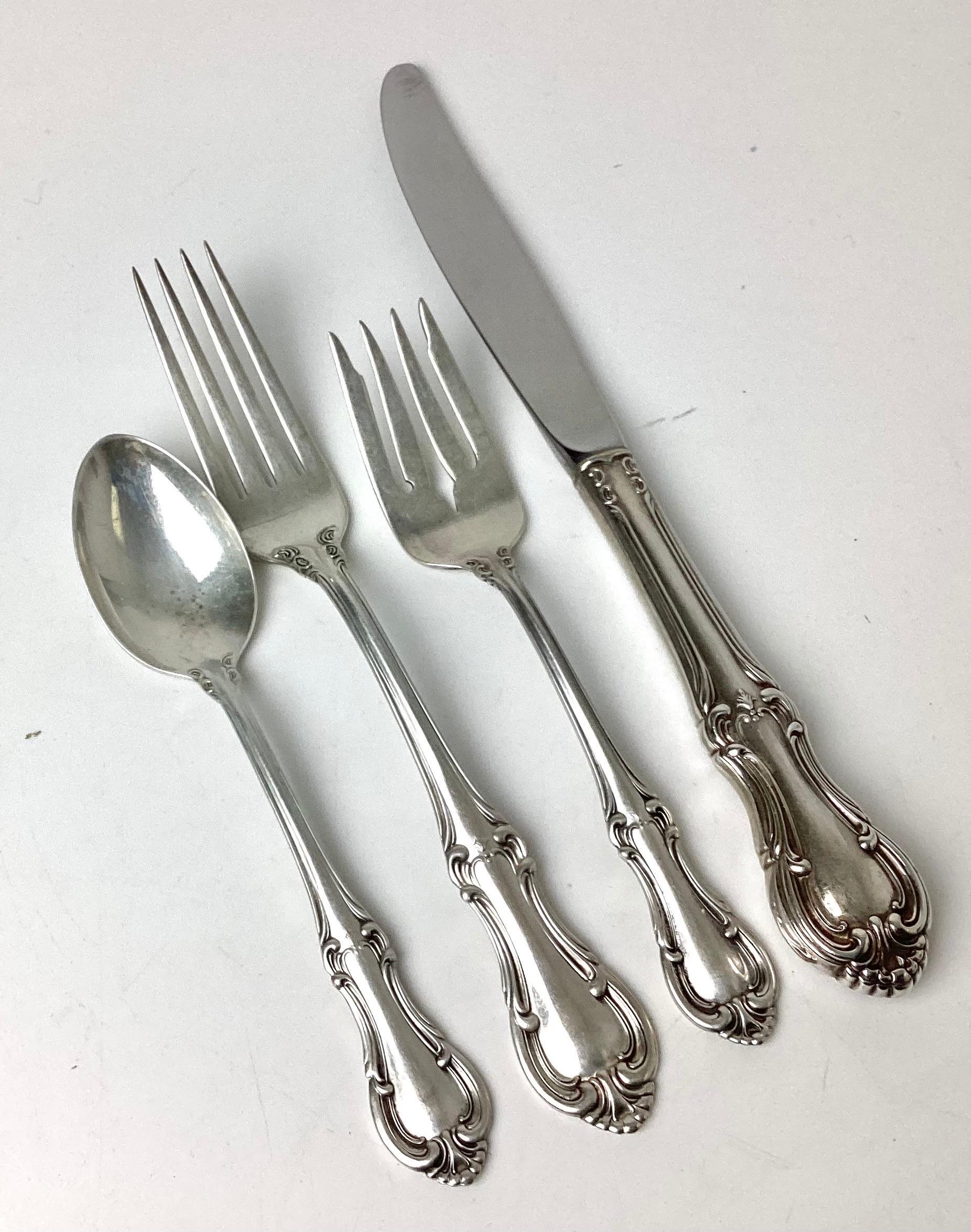 This was my mothers et bought in the early 1960's new as a wedding gift. It is a place setting for 12 with 8 serving pieces.
Dinner forks are 7 1/2