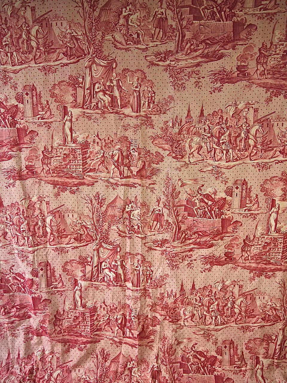 Rare toile 'La Vie de Jeanne d' Arc' from Bolbec in Northern France with various scenes from the life of Joan of Arc printed in a lovely red on a stippled ground with scattered stars.