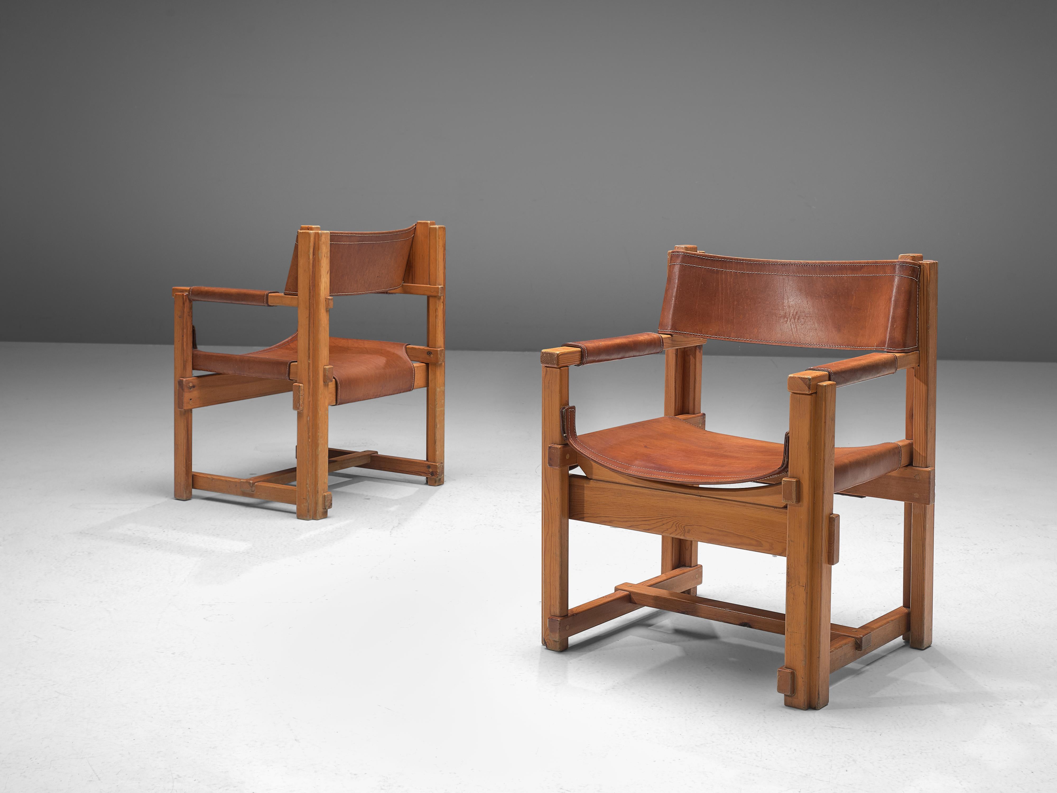 Joan Pou, armchairs, pine, leather, Spain, 1960s

This set of armchairs from Spain is strict, purist and belongs to the rationalist movement in Spain. The chairs feature an architectural frame, build up from only horizontal and vertical lines. These