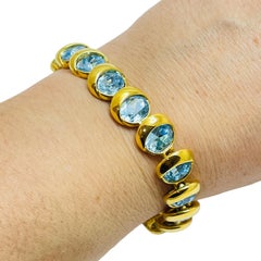 JOAN RIVERS signiertes, vergoldetes Designerarmband mit blauen Kristallen