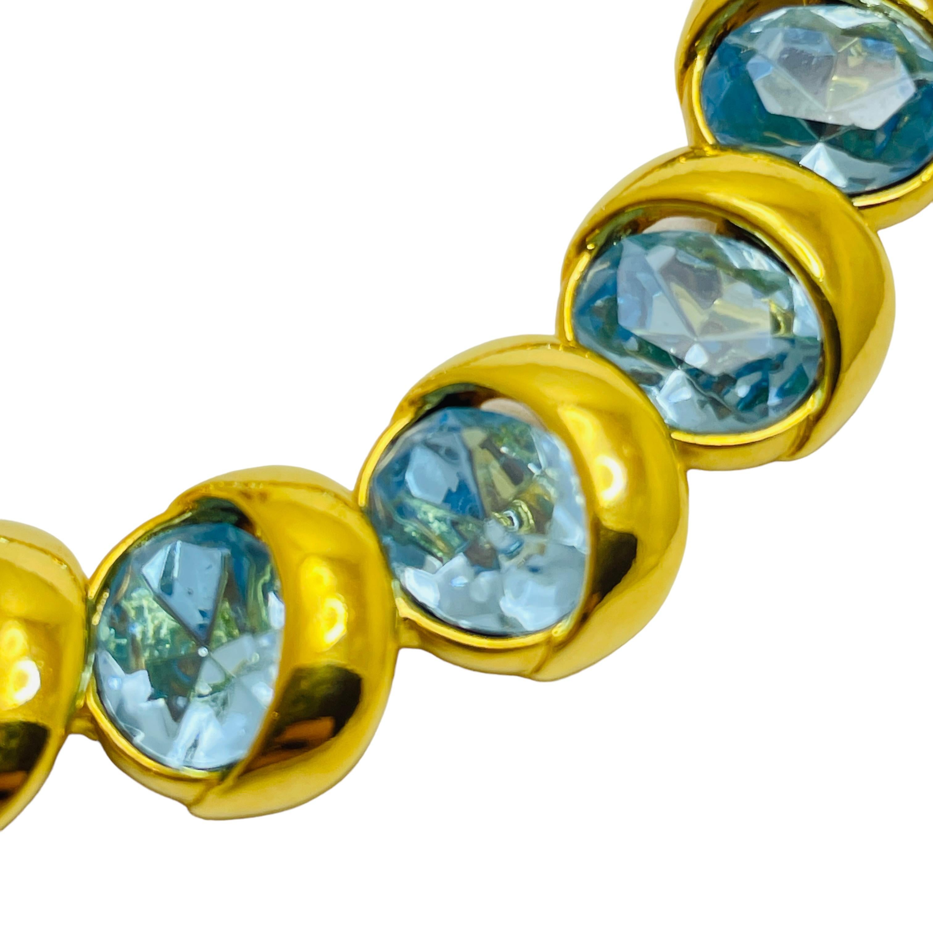 Femenino o masculino JOAN RIVERS pulsera de diseño firmada chapada en oro con cristales azules en venta