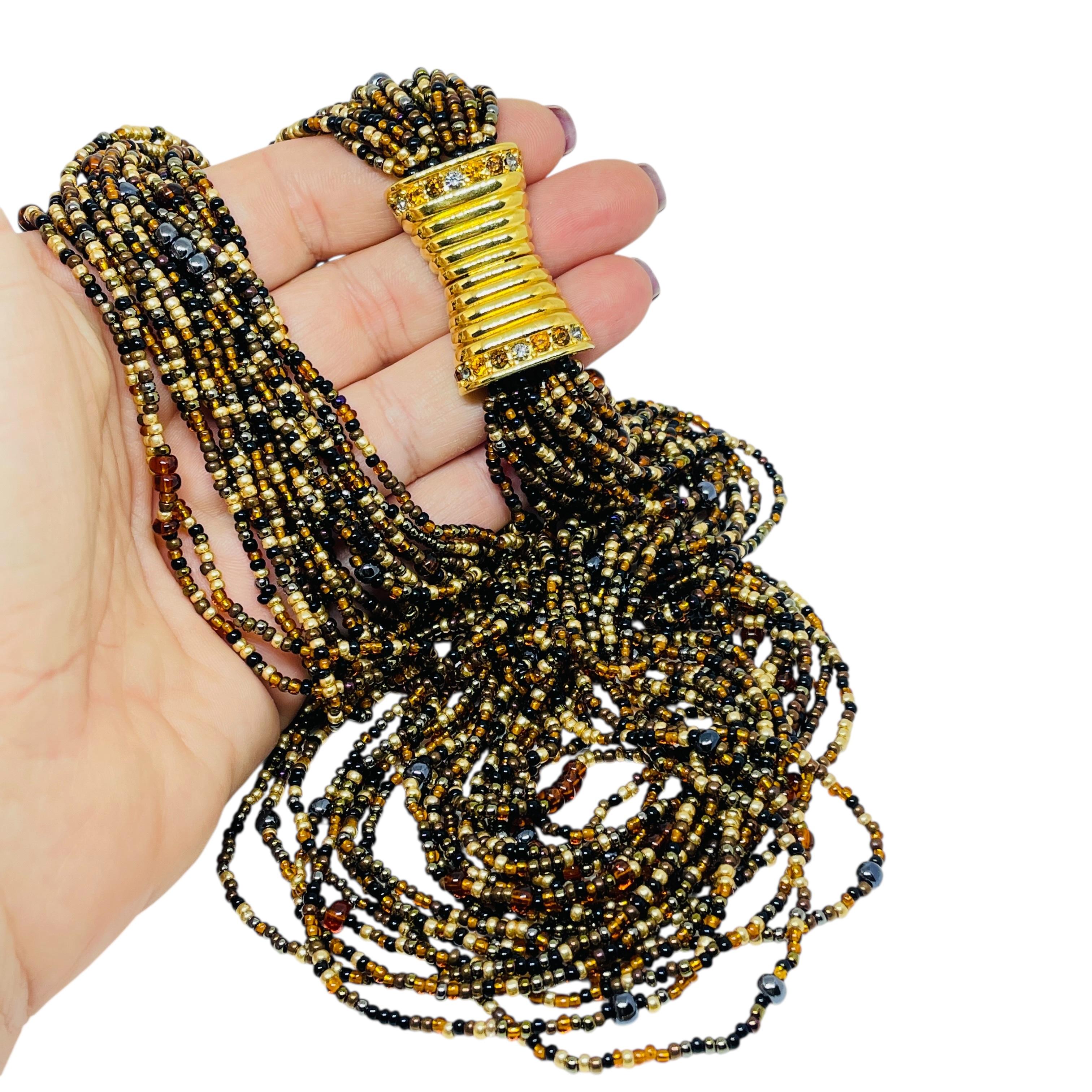 DETTAGLI

- firmato Joan Rivers

- tono oro con perline di vetro

- collana di design vintage
 
MISURE  

- CONDIZIONE

-  ottime condizioni vintage con minimi segni di usura 

 Sku 56

❤️❤️   GIOIELLI DI DESIGN VINTAGE   ❤️❤️

❤️❤️  ALEXANDER'S