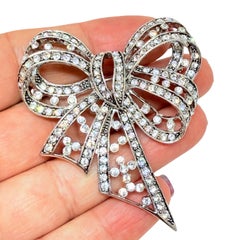 JOAN RIVERS signed vintage silver tone rhinestones designer bow brooch