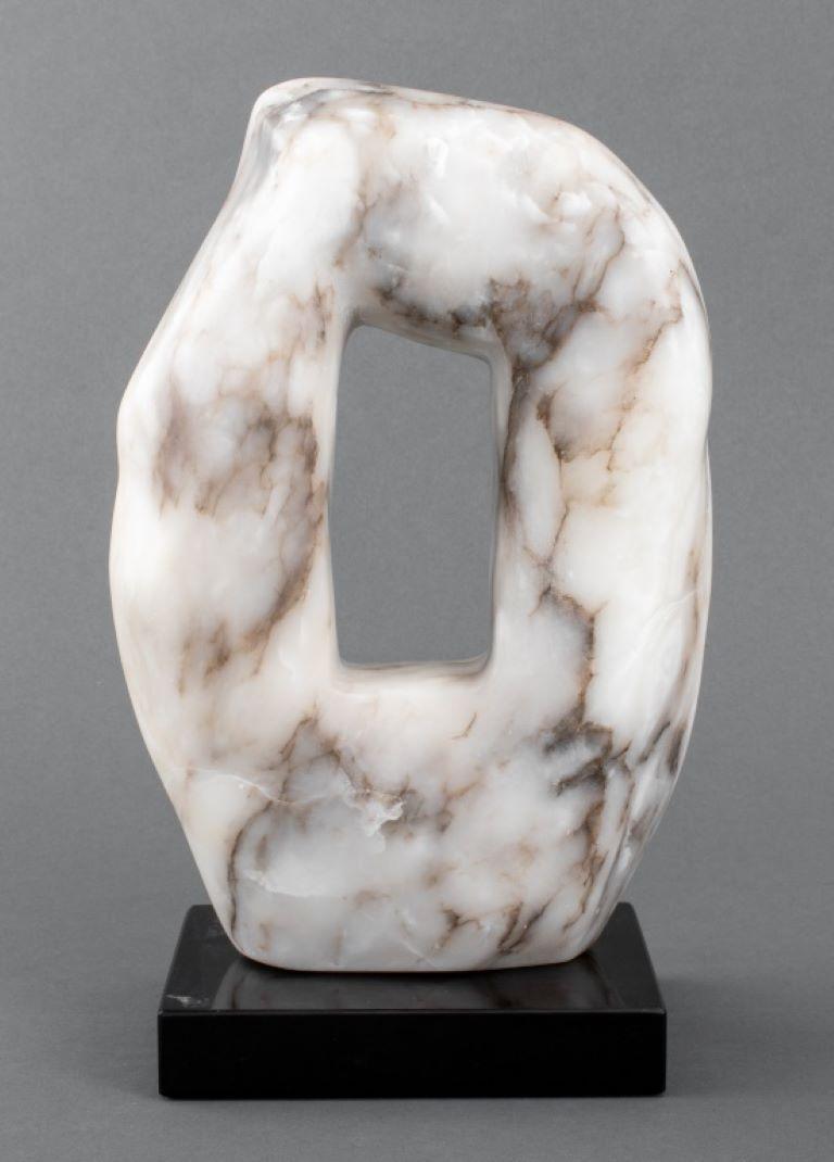 Joan Hyde Shapiro (American, XX-XXI) Modern abstract veined gray white alabaster stone sculpture carved into an organic freeform shape with central rectangular cutout, signed to reverse, mounted on a black marble base. Provenance: From the
