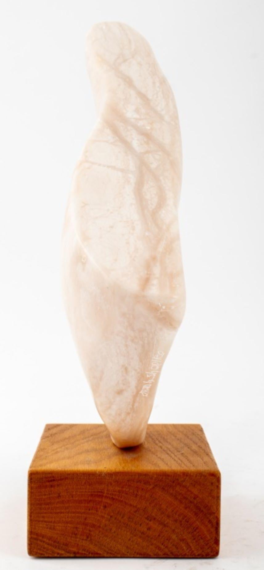 Joan Hyde Shapiro (American, XX-XXI) pale pink alabaster stone sculpture of an abstract organic freeform shape with a rectangular cutout, signed to side, mounted on a wood base. Overall: 13.5