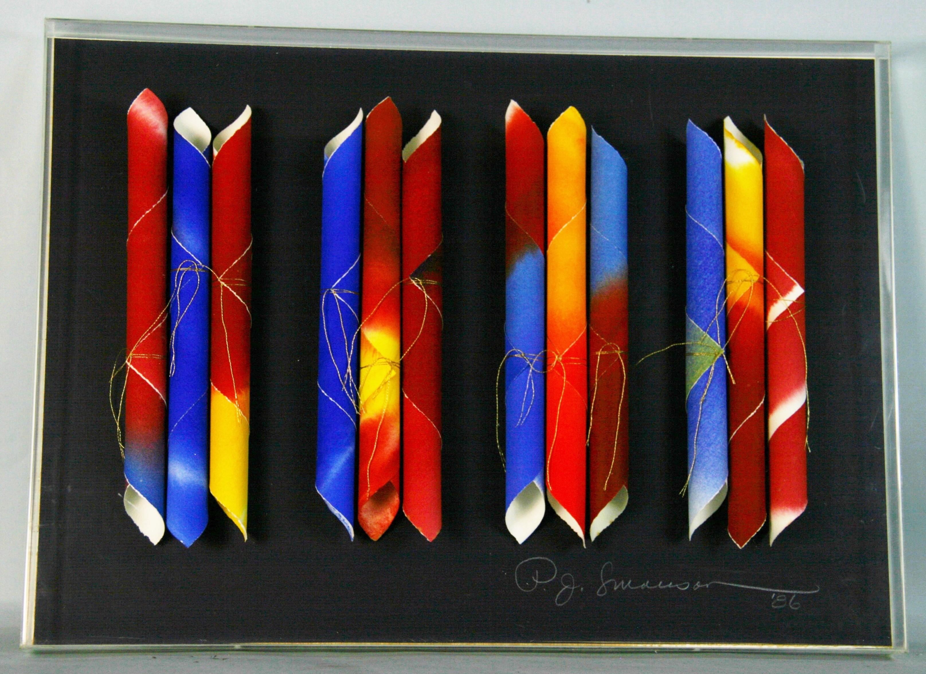 3991 Sculptural Art piece rolled archival acrylic painted paper set in a custom acrylic frame on dark blue back round