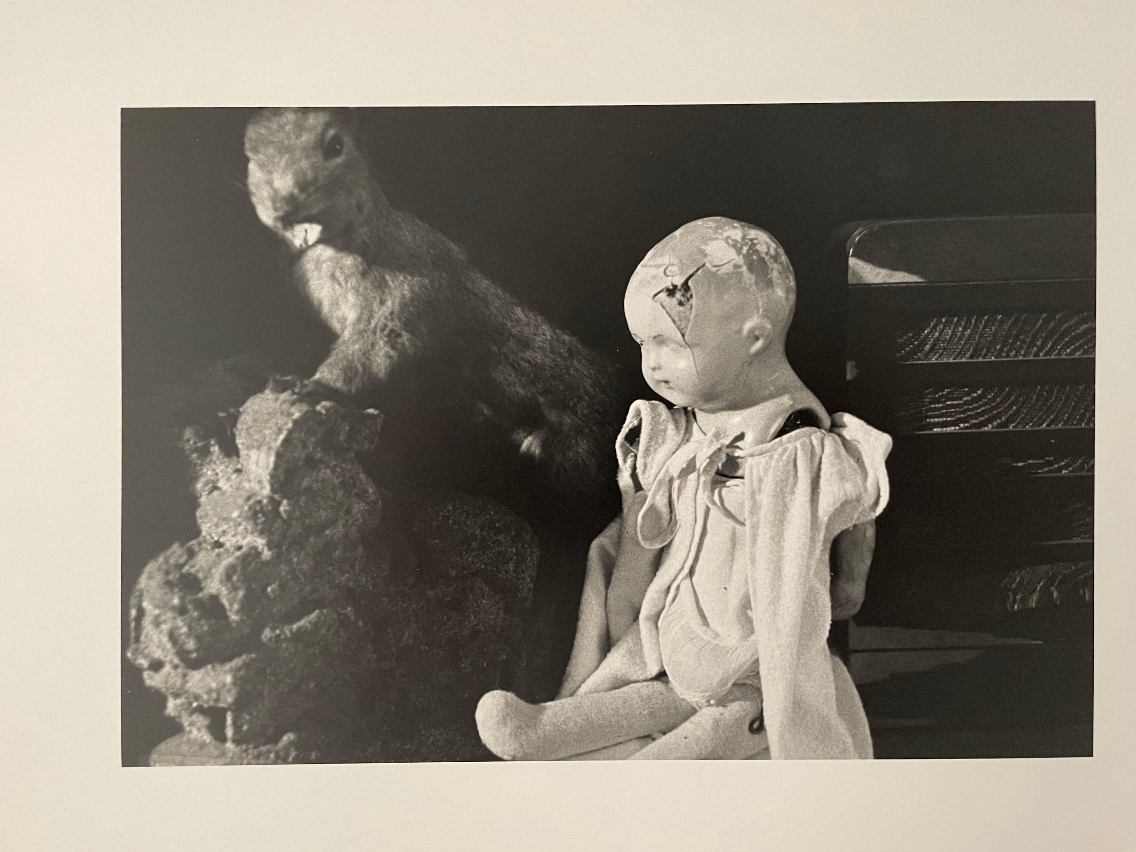 Vintage Silver Gelatin Photograph Surrealist Doll Art Photo, Jazz Photographer - Black Still-Life Photograph by JoAnn Krivin