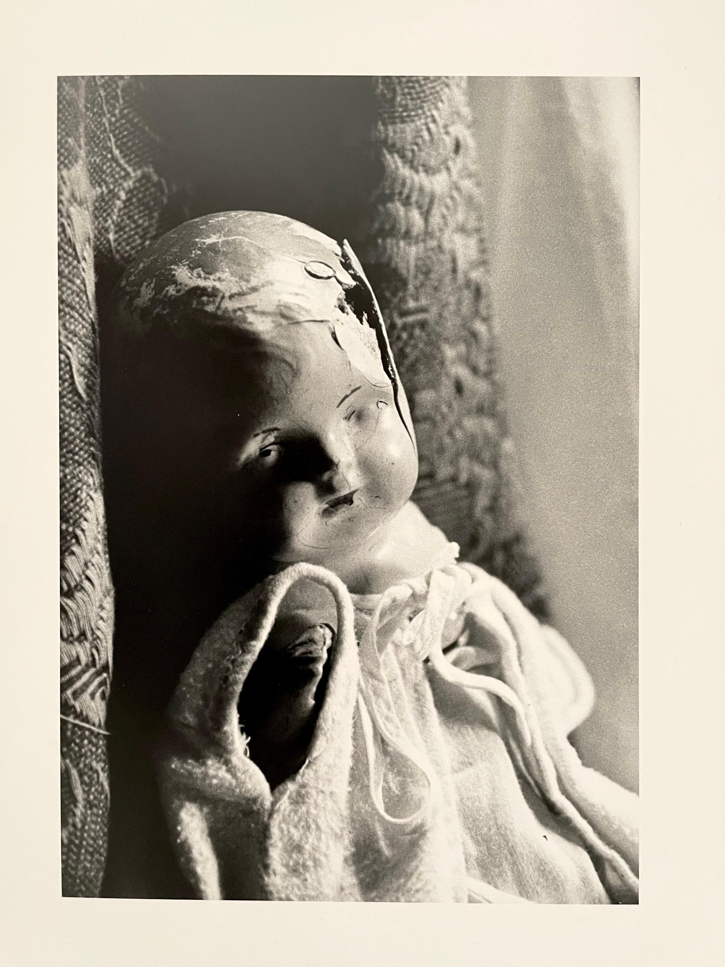 These were from a show of her work. Influenced by Surrealism and Dada Photographs 
these are images of old children's dolls in various states of decay. These bear the influence of Hans Bellmer, Dora Maar and Man Ray.

Jo Ann Krivin born in Reasnor,