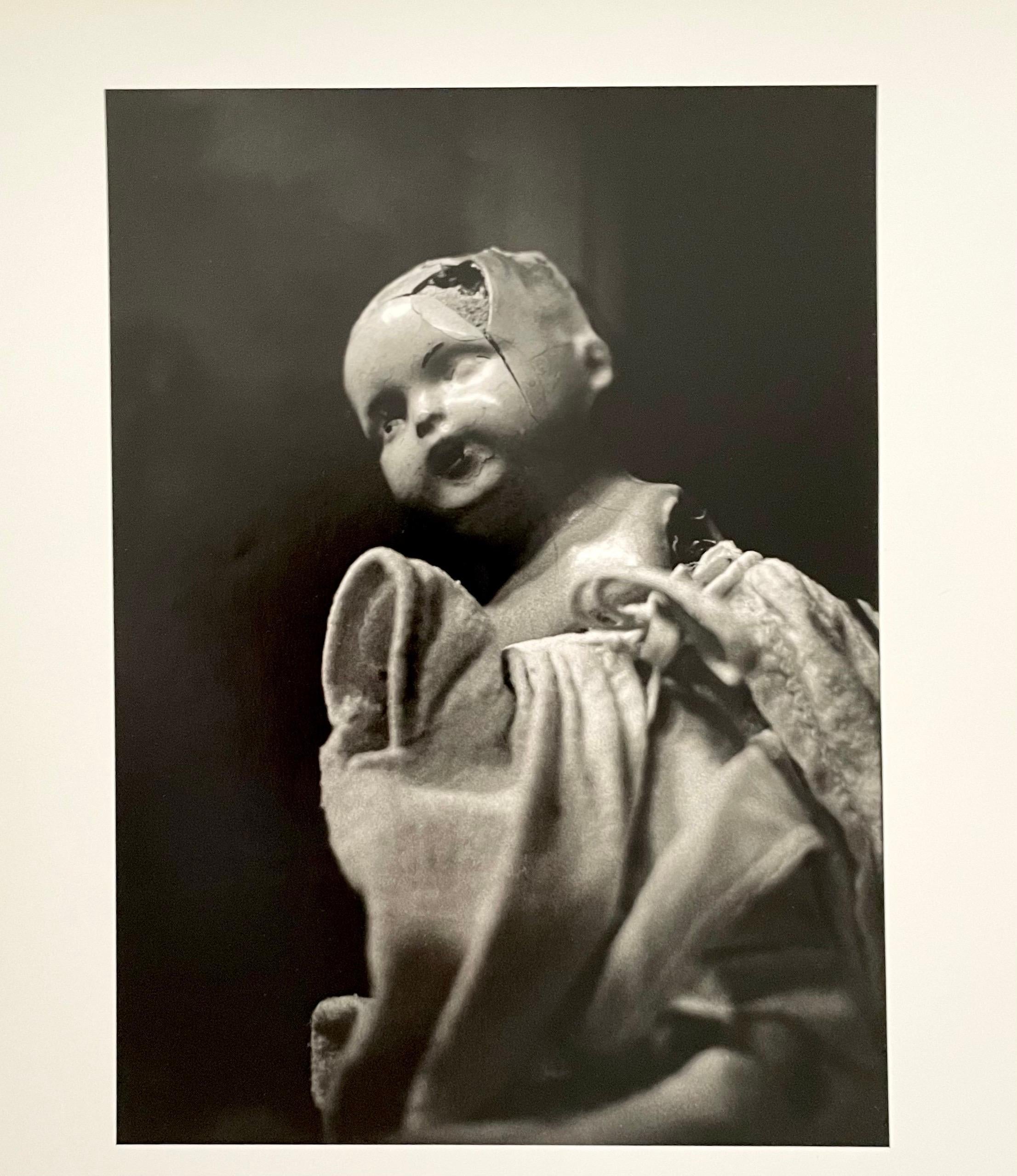 These were from a show of her work. Influenced by Surrealism and Dada Photographs 
these are images of old children's dolls in various states of decay. These bear the influence of Hans Bellmer, Dora Maar and Man Ray.

Jo Ann Krivin born in Reasnor,