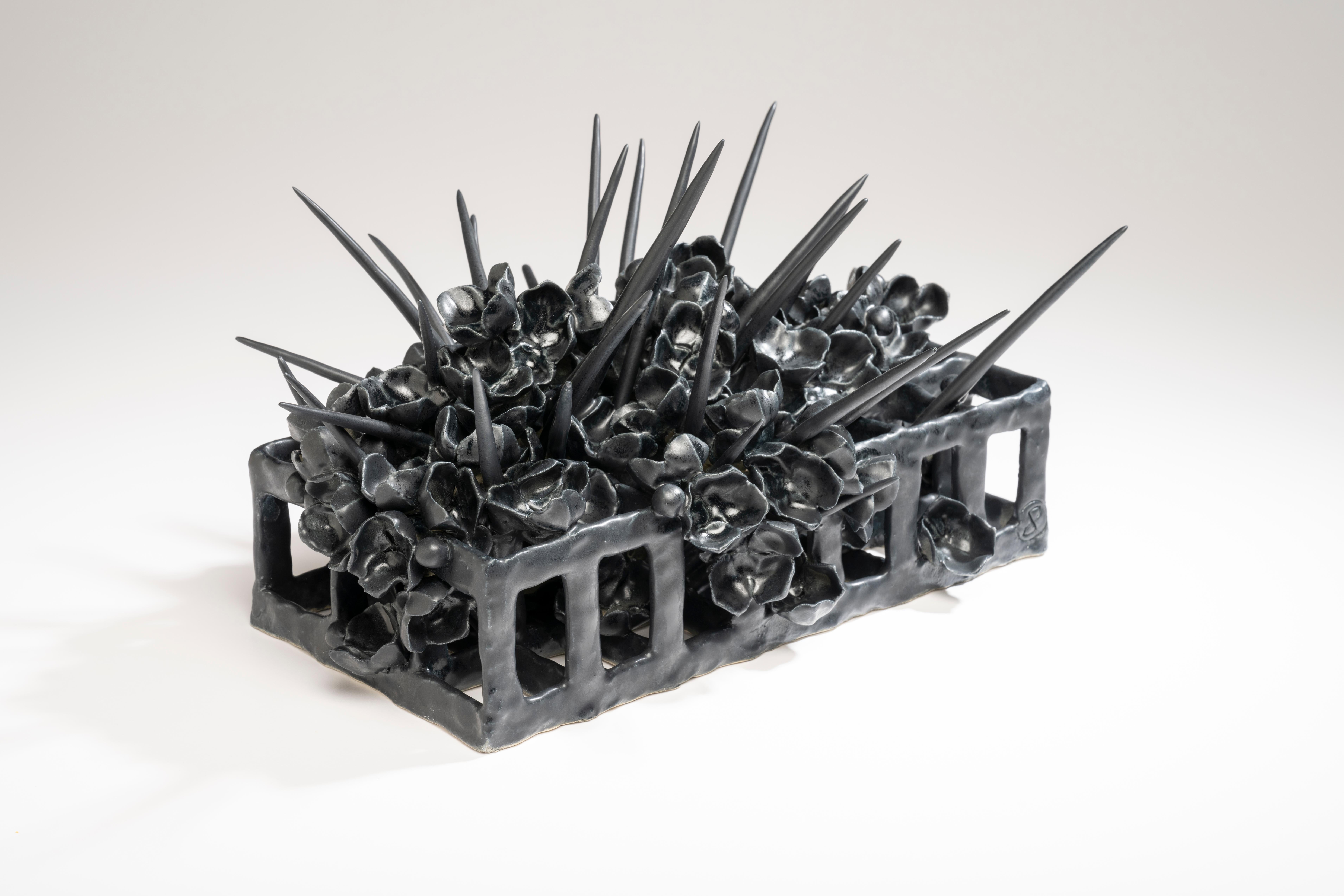 Contemporary American ceramic artist Joanna Poag's Binding Time (Black Grid with Quills) table top sculpture is part of a series. It's hand built clay, high fired to cone 6 with glaze. Binding Time explores entropy as it relates to personal
