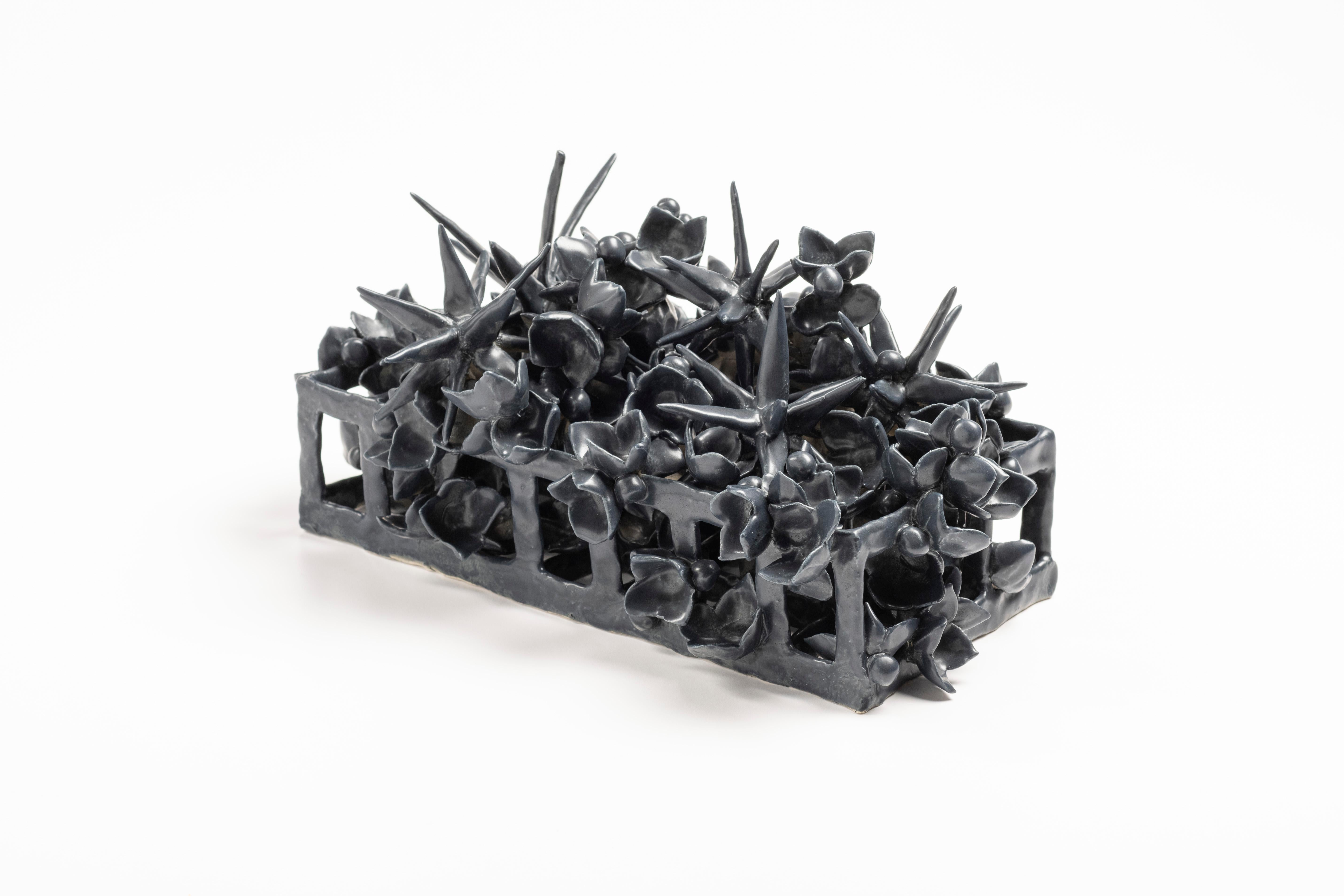 Contemporary American ceramic artist Joanna Poag's Binding Time (Black Grid with Stars) table top sculpture is part of a series. It's hand built clay, high fired to cone 6 with glaze. Binding Time explores entropy as it relates to personal