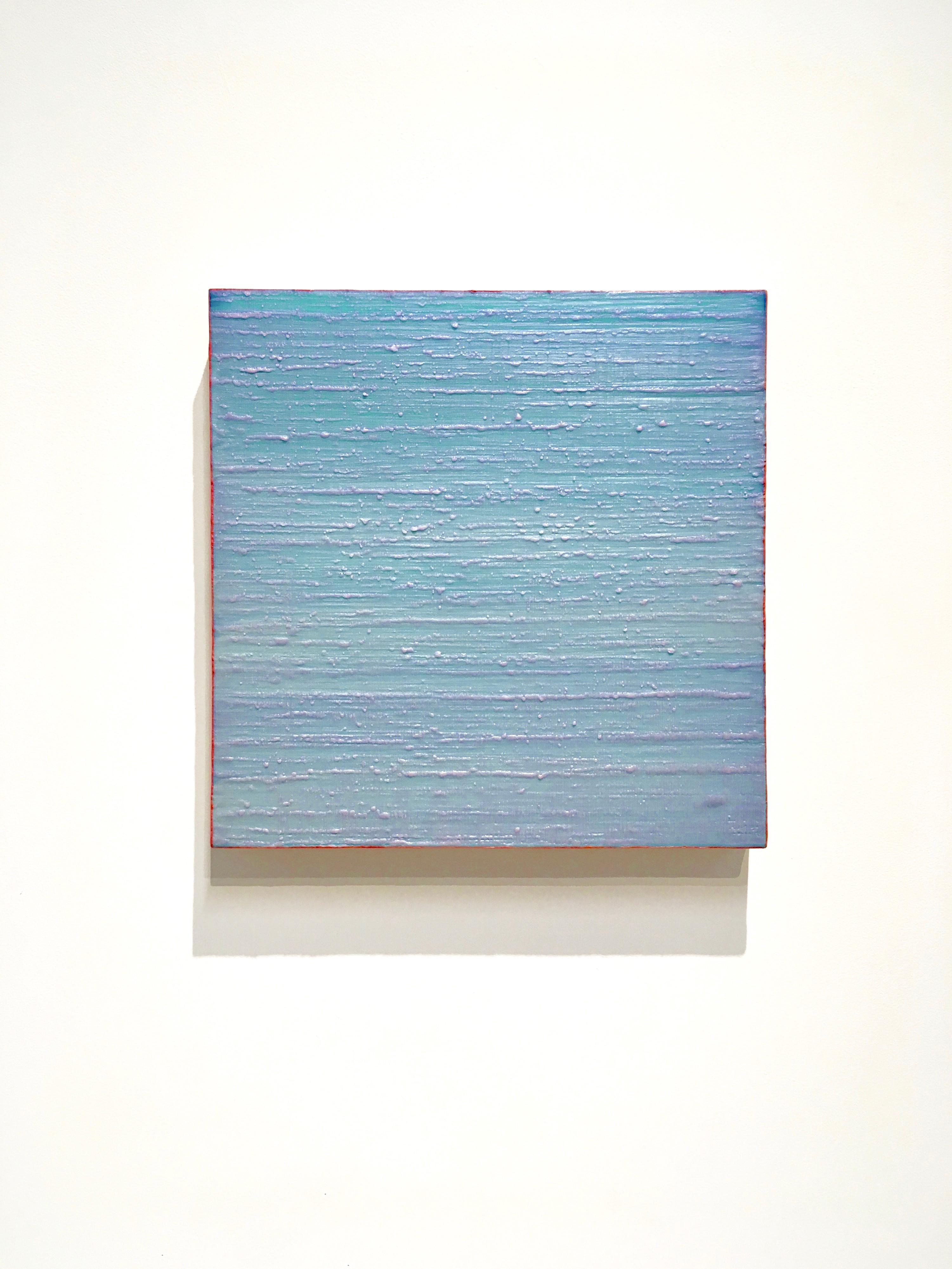 A luminous pale blue encaustic (pigmented beeswax) painting on birch panel accented with bright coral along the edge of the panel. Signed, dated and titled on verso.

Joanne Mattera’s paintings can be described as lush minimalism, the work is