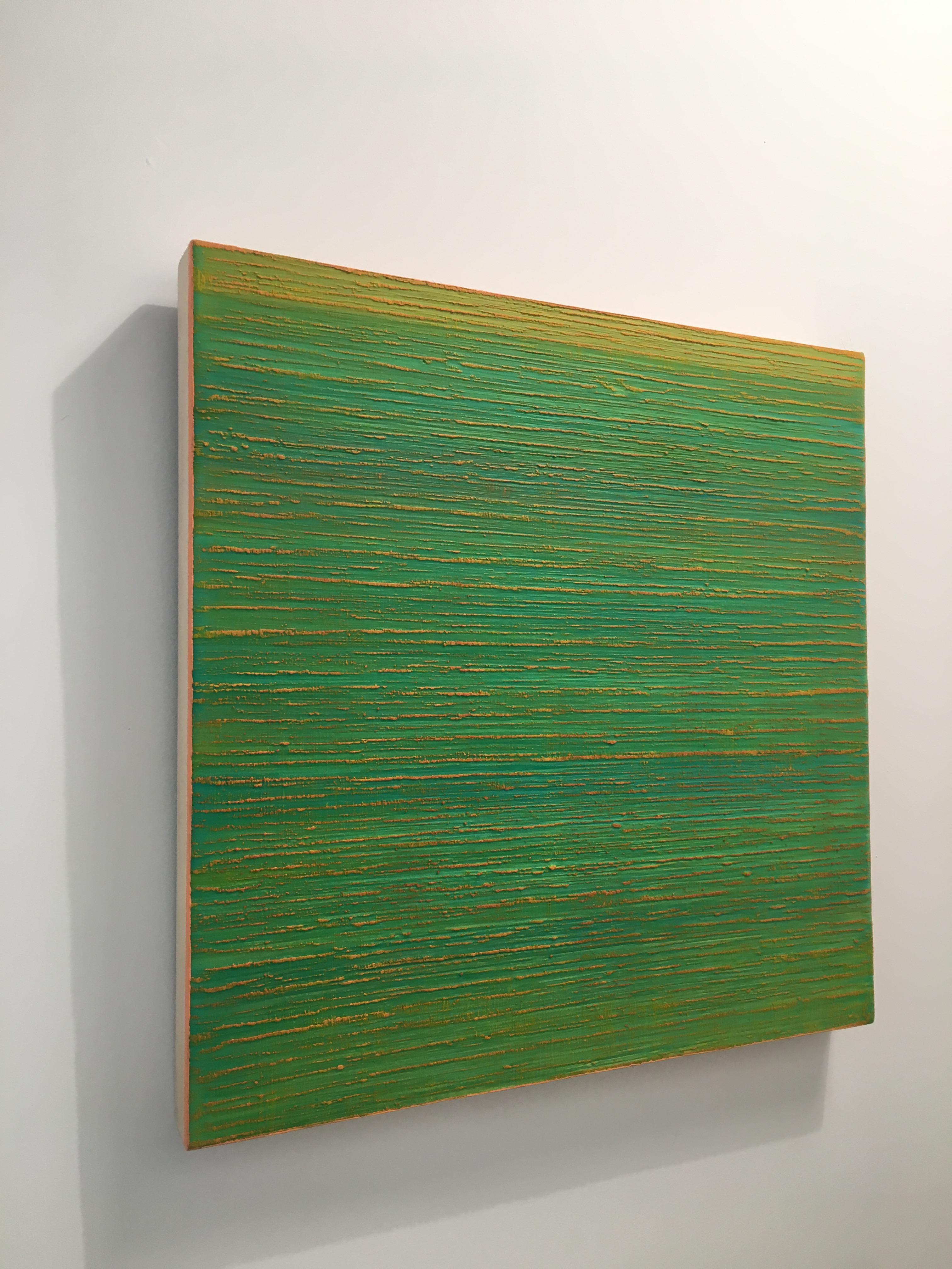 A bright green encaustic (pigmented beeswax) painting on birch panel with yellow in the background and peach along the edges. Signed, dated and titled on verso.

Joanne Mattera’s paintings can be described as lush minimalism, the work is