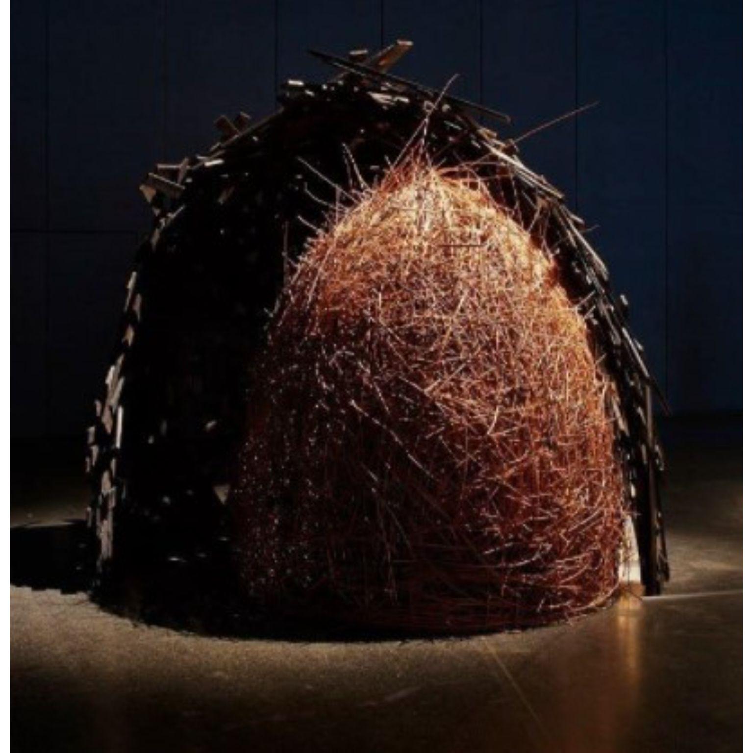 João do Pau Nest wall separating + sculpture by Mameluca
Material: Vime Branches, Pallets, others
Dimensions: D 300x H 250 cm

Birds build huge nests with twigs (reason of common name). Twigs are relatively large for bird size. The couple acts
