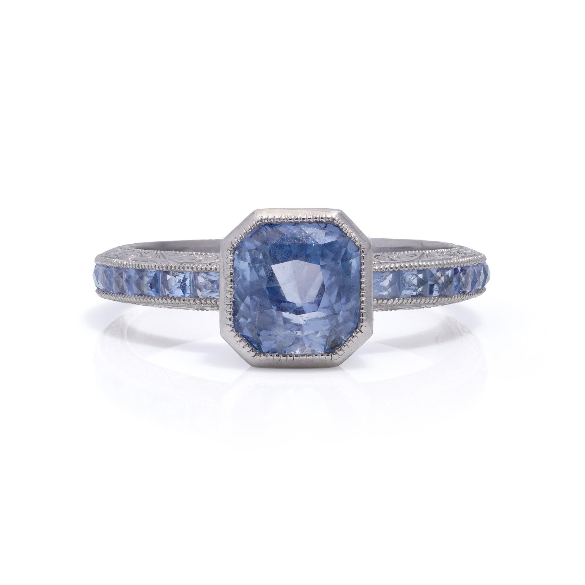 JoAq 850 Platinum Art Deco-inspired Sapphire ring. 
The ring is nicely set with an octagon-shaped centre sapphire and surrounded by French-cut sapphires. 

Dimensions - 
Ring Size (UK) = M 1/2 (EU) = 54.5  (US) = 6.75 
Weight: 5.00 grams

Sapphires