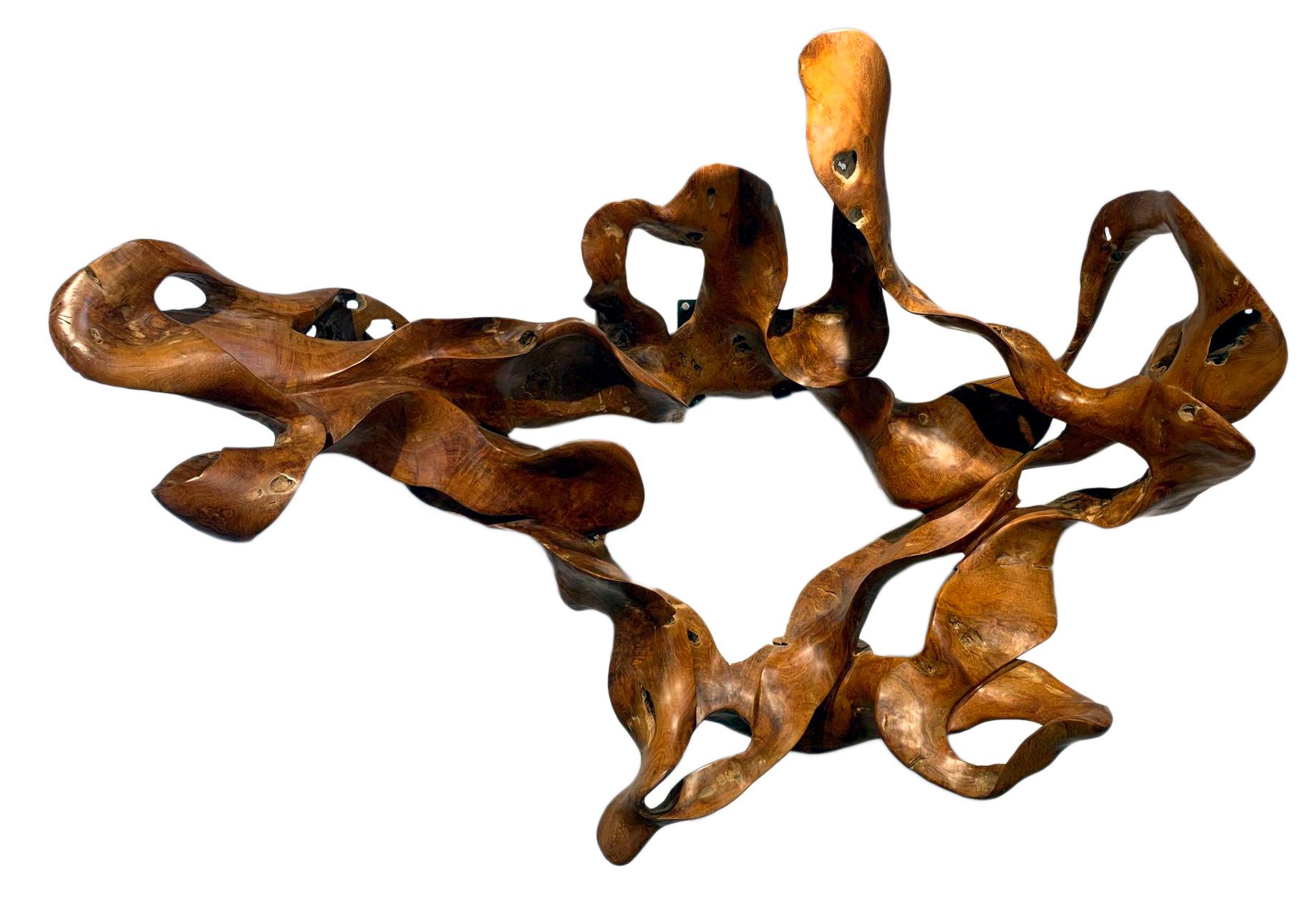 Mahogany root

The Ingravidesa Sculpture Alliance is formed by an international group of sculptors and designers who collaborate to create abstract sculpture inspired by nature. They often work together for months on monumental projects. The pieces