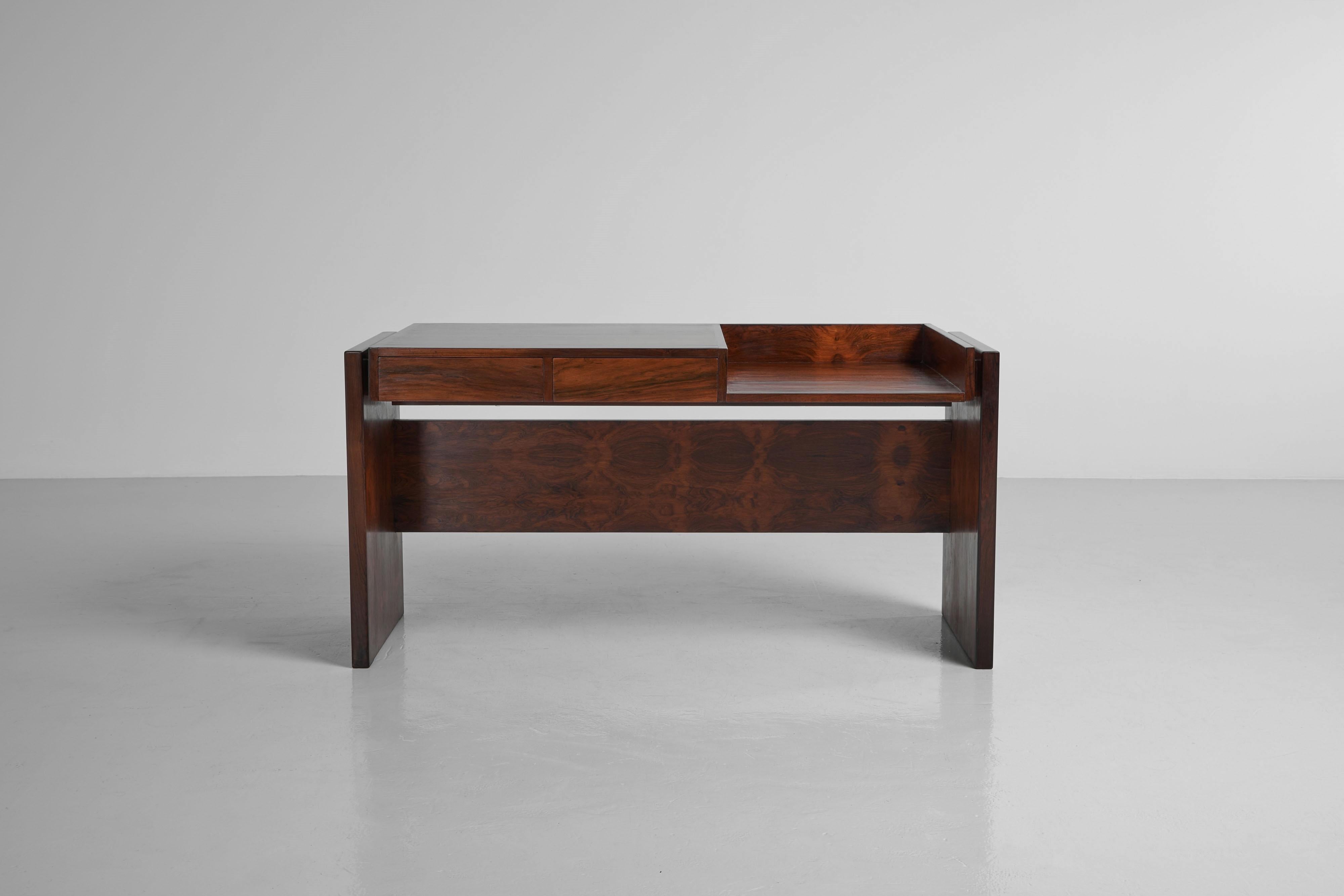 Beautiful Bloch writing desk designed by Joaquim Tenreiro and manufactured in Brazil 1965. This desk was once used in the BLOCH EDITORES S.A. BUILDING, a well-known Brazilian publisher that operated from 1952 to 2000. Tenreiro himself furnished the