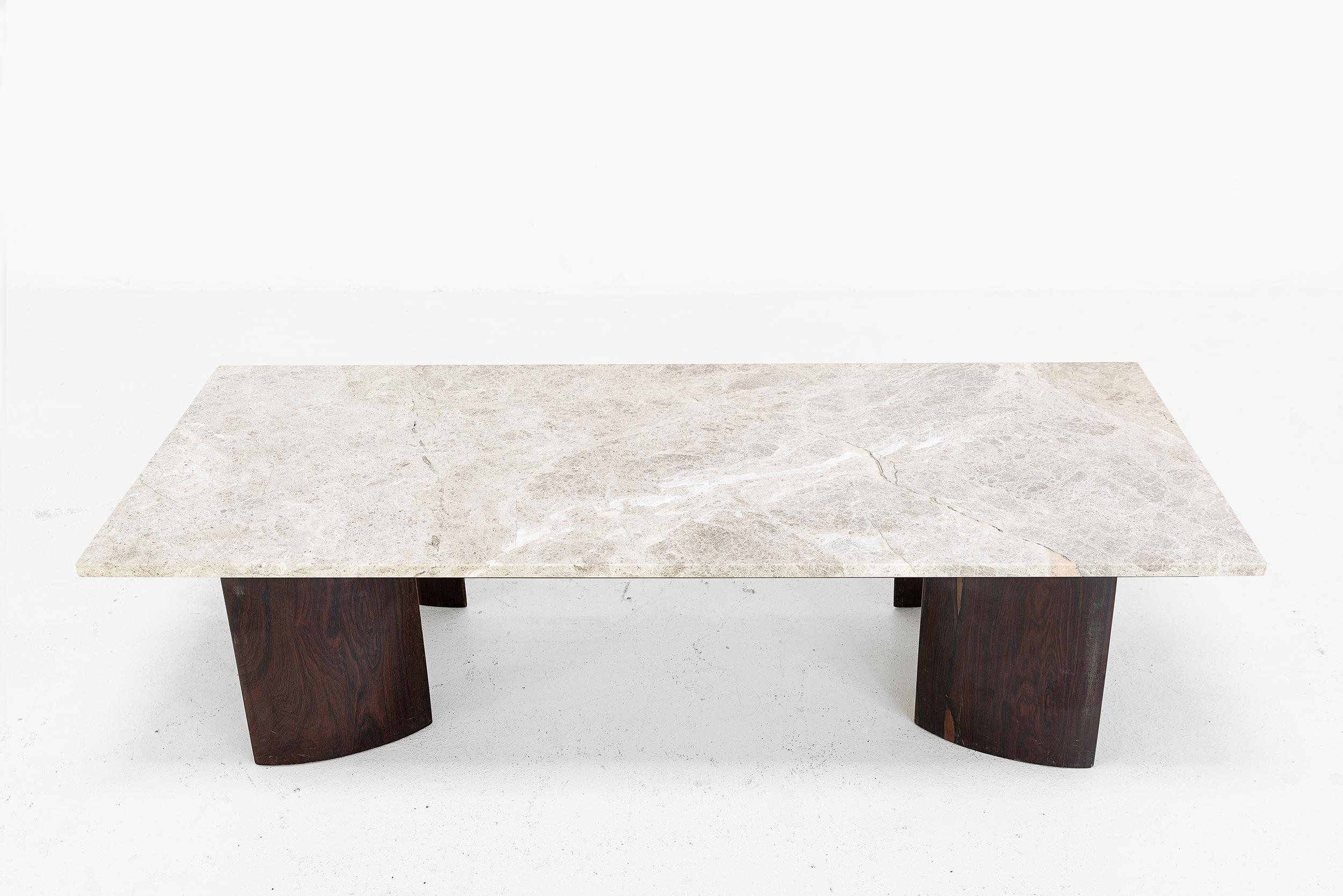 Joaquim Tenreiro
Coffee table
Manufactured by Tenreiro Moveis e Decoraçoes
Brazil, 1950
Jacaranda wood, marble “beige snake”
From the archives of Side Gallery, Barcelona

Measurements
130 cm x 55 cm x 32 H cm
51.18 in x 21.65 in x 12.59 H