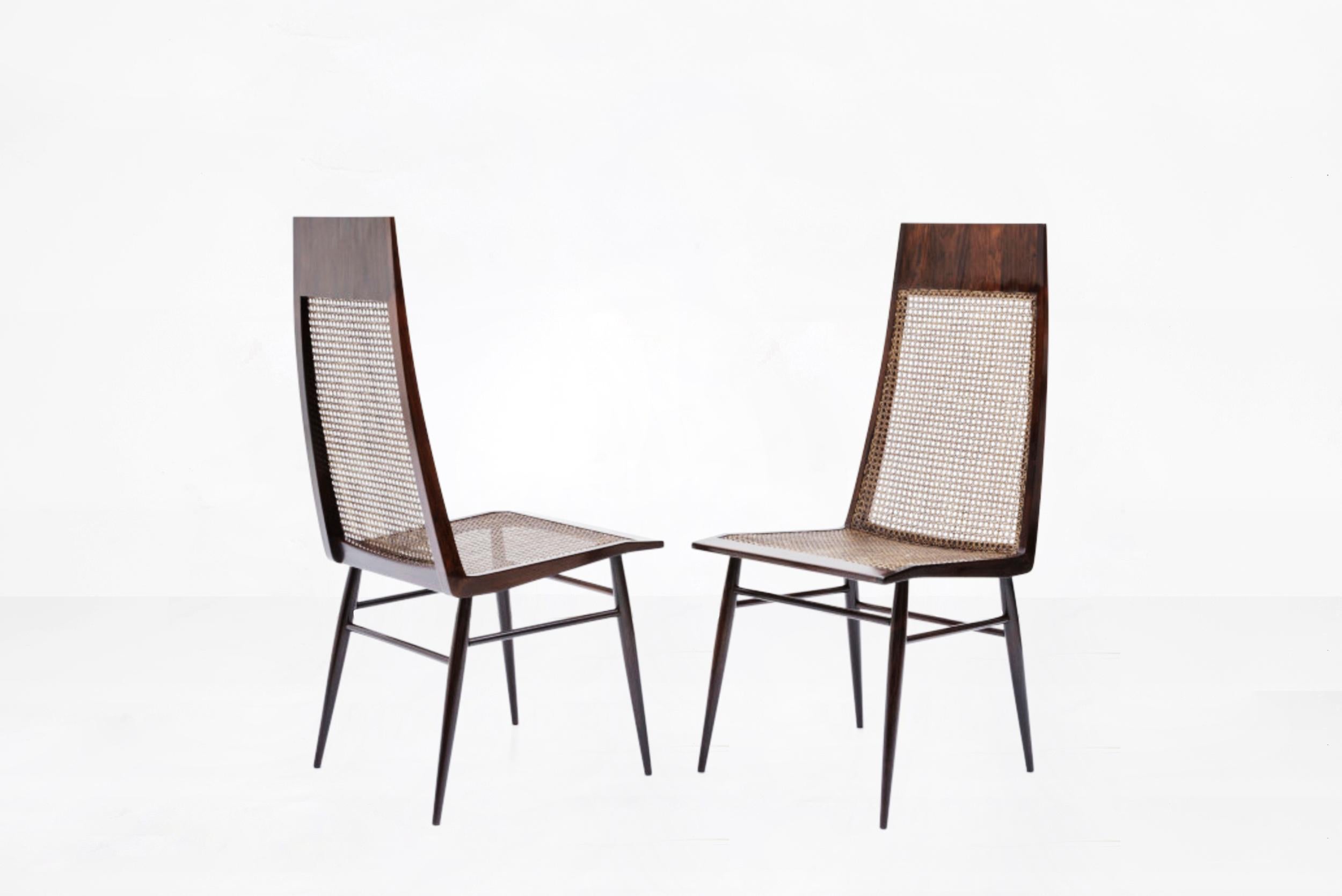 Joaquim Tenreiro

Pair of dining chairs
Manufactured by Tenreiro Moveis e Decoraçoes
Brasil, 1950
Jacaranda wood, cane
From the archives of Side Gallery, Barcelona

Measurements
44.8 cm x 58.4 cm x 104.8 H cm
15.87 in x 23 in x