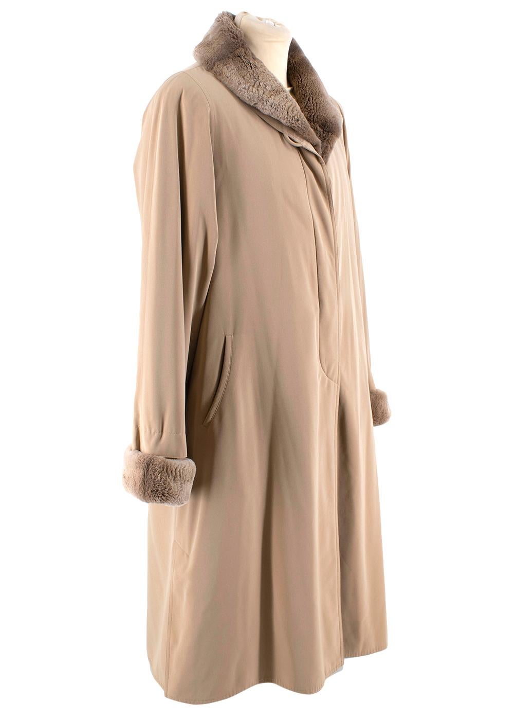 Jobis Beige Fur Inner-Lined Longline Coat

- Beige sheen outer 
- Faux fur inner lining 
- Faux fur collar and sleeve cuffs
- Front button fastening 
- Side welt pockets 
- Side vents 
- Detachable overcoat

Materials:
Main - 100% Polyester 
Lining