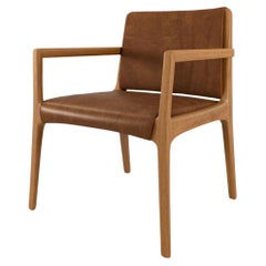 Modern and minimalist "Joca" armchair in fabric or leather