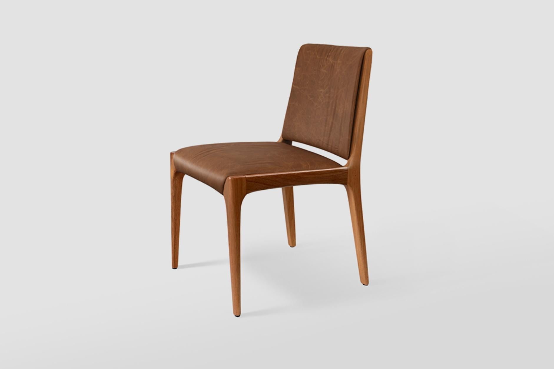 When she created Joca chair, Alessandra Delgado wanted a piece with delicate features, exploring the curves of the wood with a design inspired by the master designer Joaquim Tenreiro's work. Joca chair is made of solid wood and although very sturdy