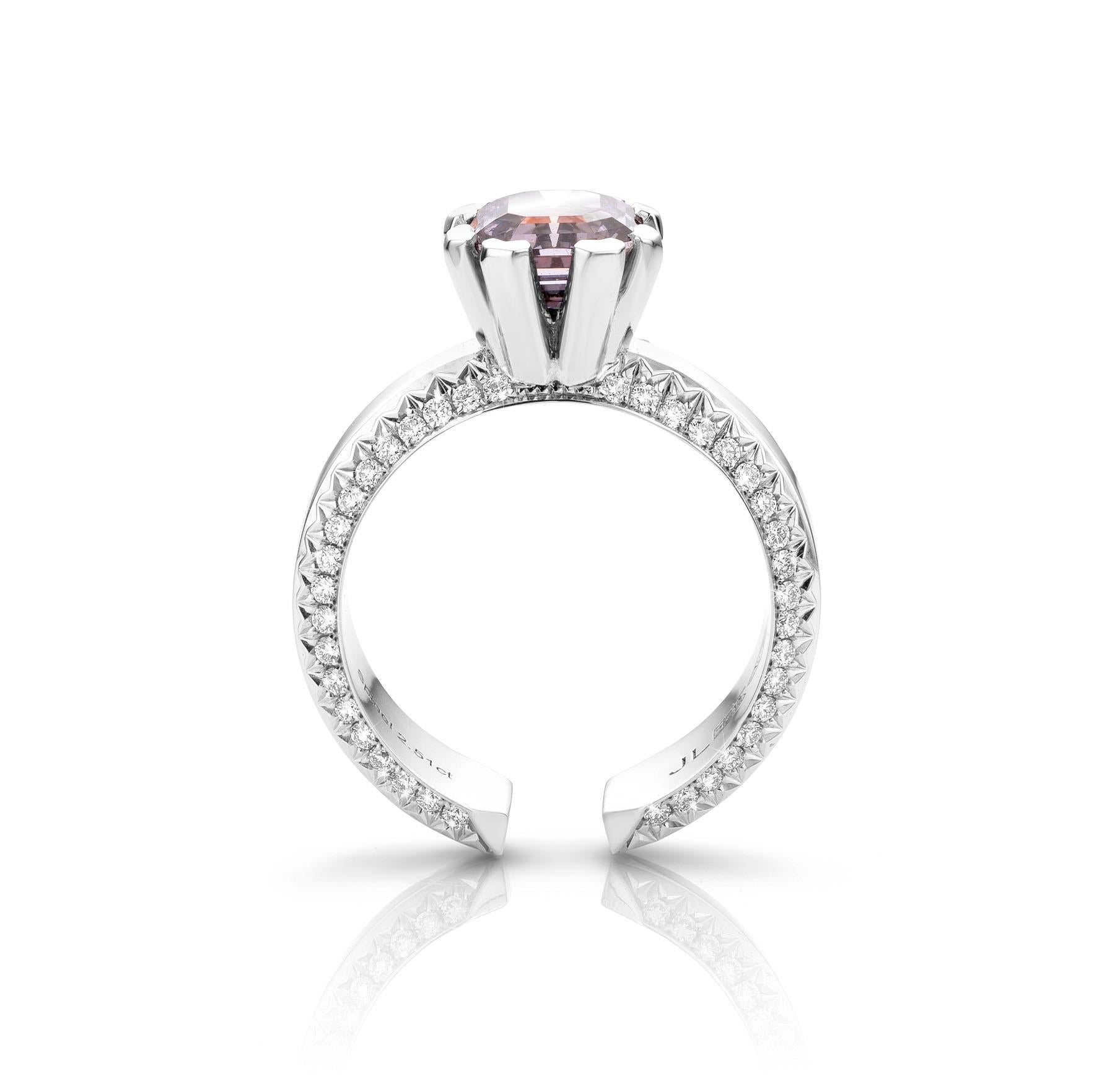 18 Karat White gold Cocktail Ring featuring a 2.51 Carat Grey Purple Spinel stone.

Emerald cut measuring 8 x 7 mm.
The Grey Purple Spinel is set with Collection Grade Diamonds weighing 0.32 ct.